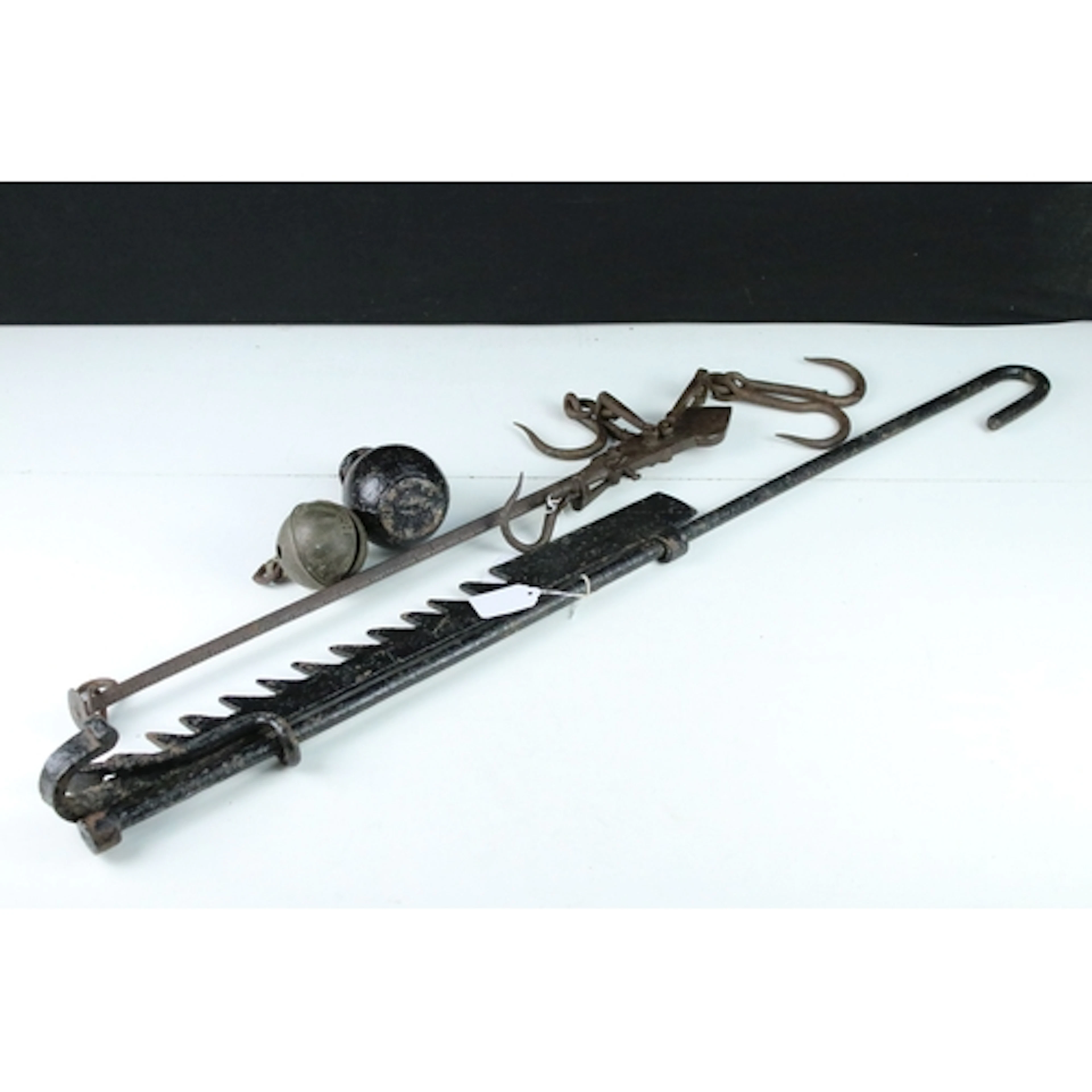 Antique cast iron three hook beam slide, marked for Robinson...