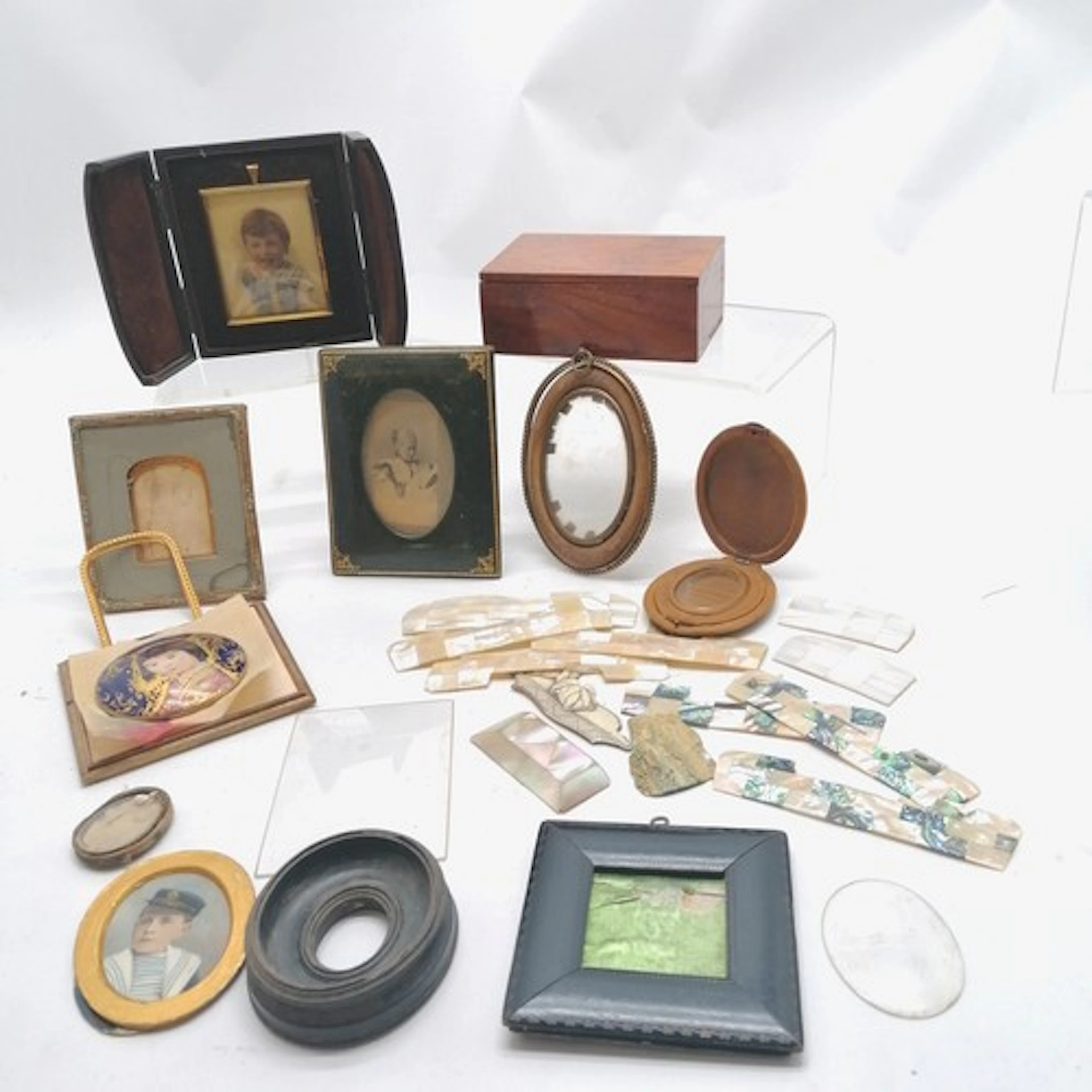 Leather cased portrait miniature of a child (case 12cm x 10c...