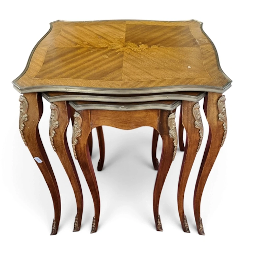 A good Mahogany and Veneered Continental nest of three Table...