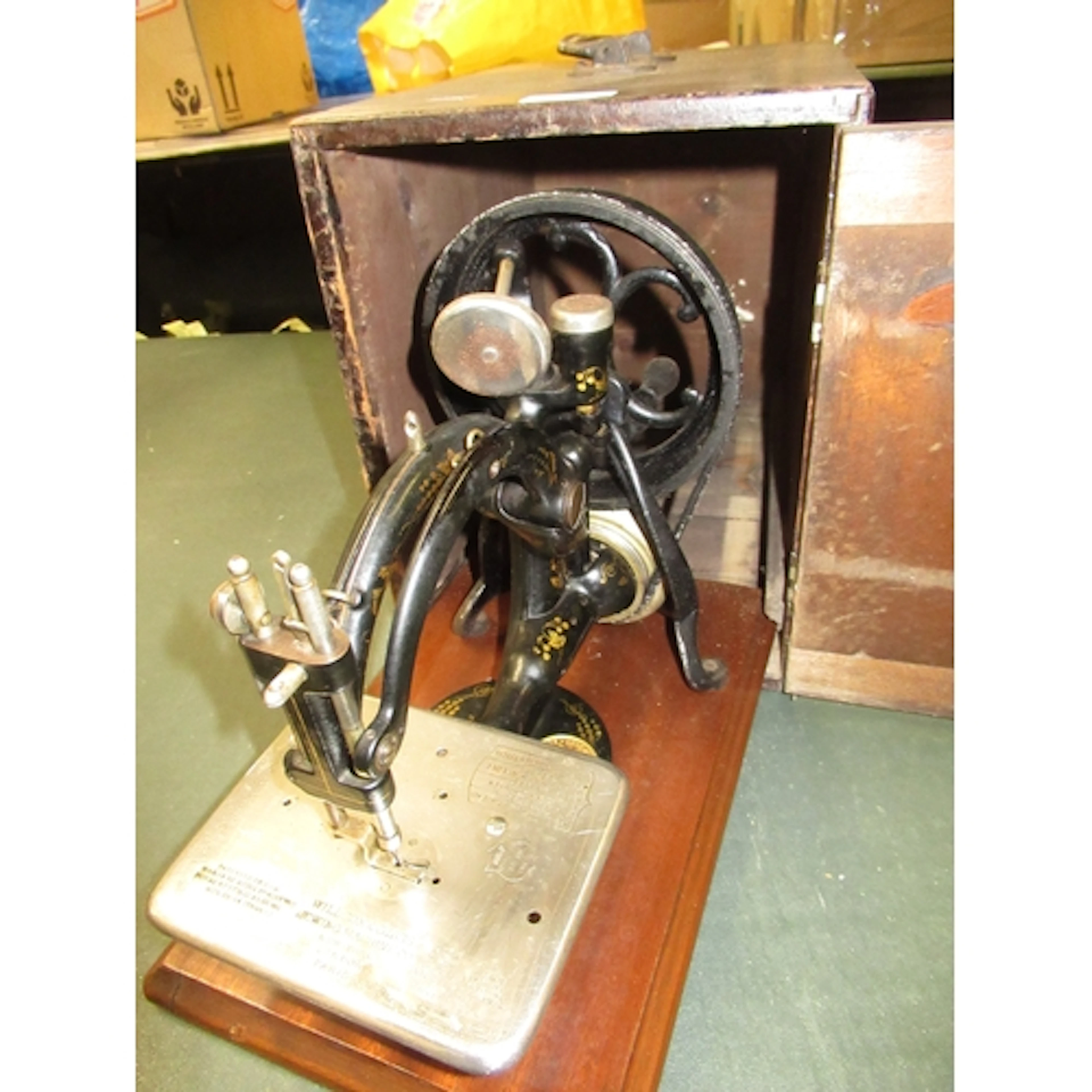 Willcox and Gibbs sewing machine, in original pine case