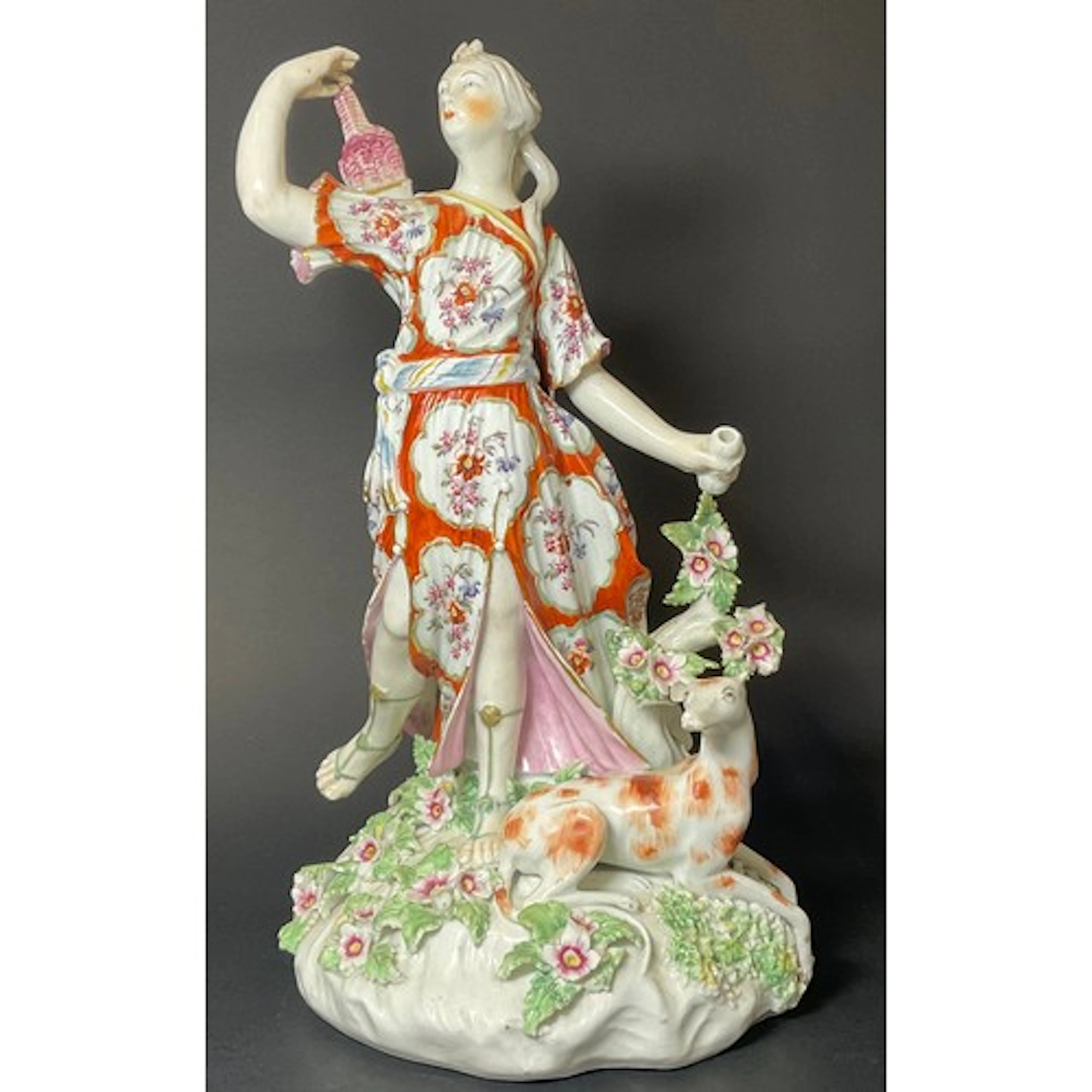 A Derby patch mark figure, Diana with Hunting Dog, she stand...