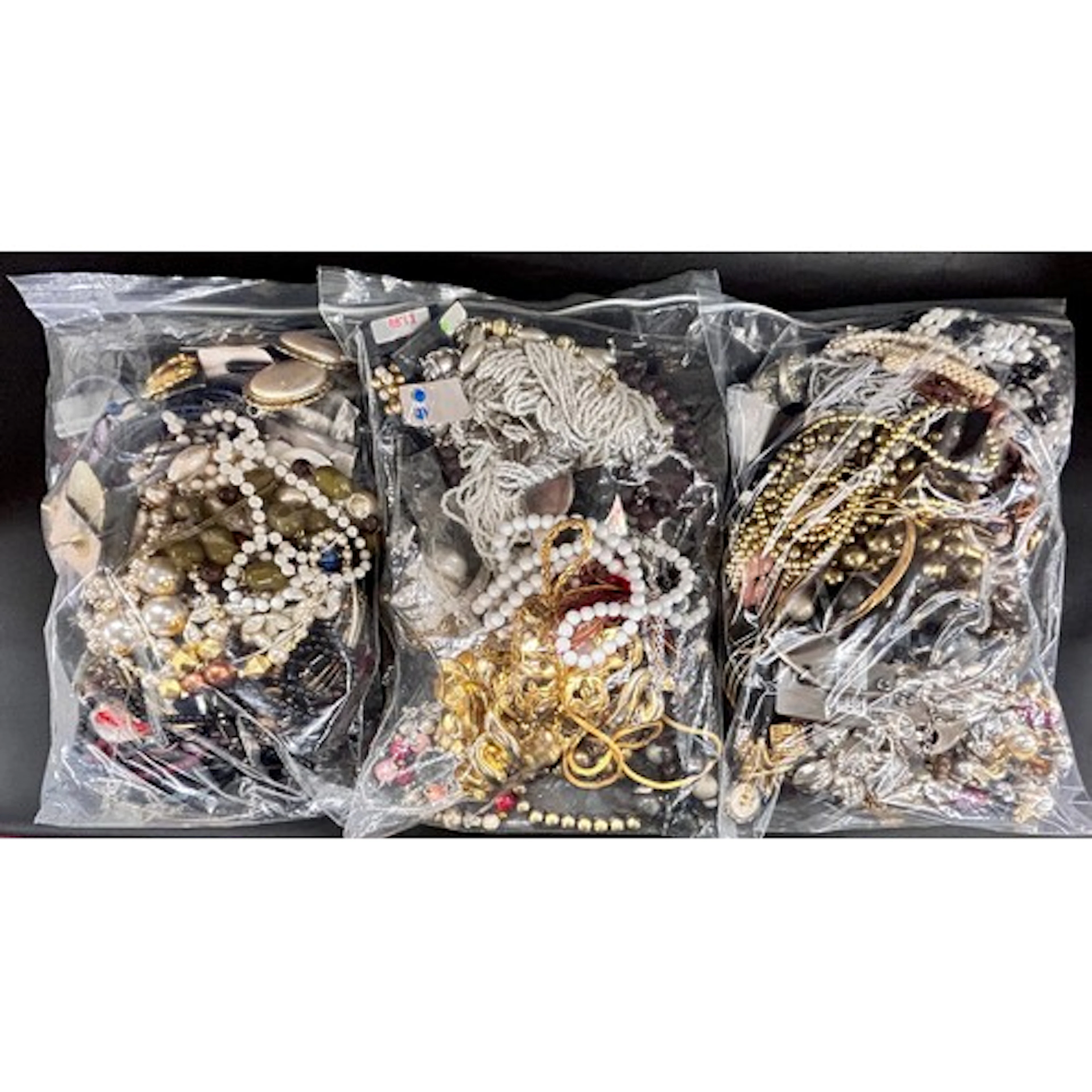 A collection of costume jewellery, (3 bags)