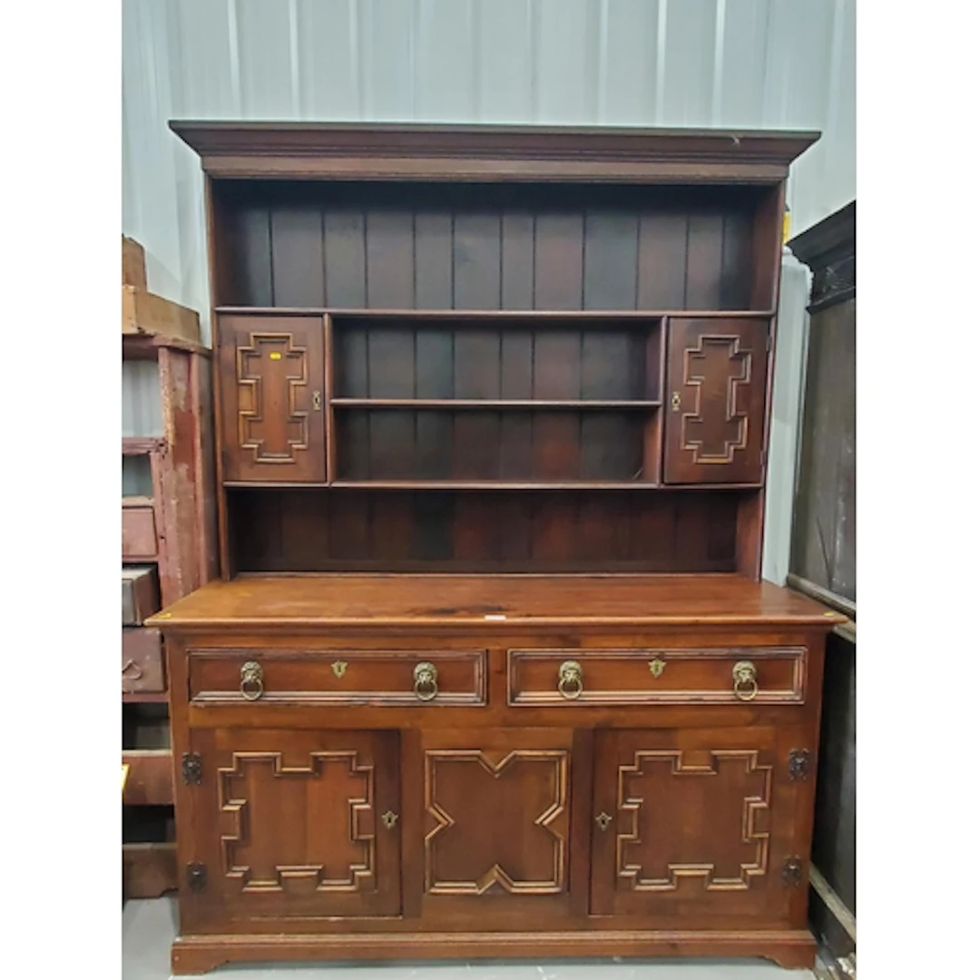 A large oak Dresser and Rack, the base fitted drawers and cu...