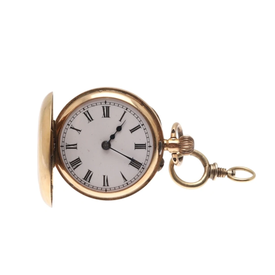 A SMALL 14CT GOLD HALF HUNTING CASED POCKET WATCH. the white...