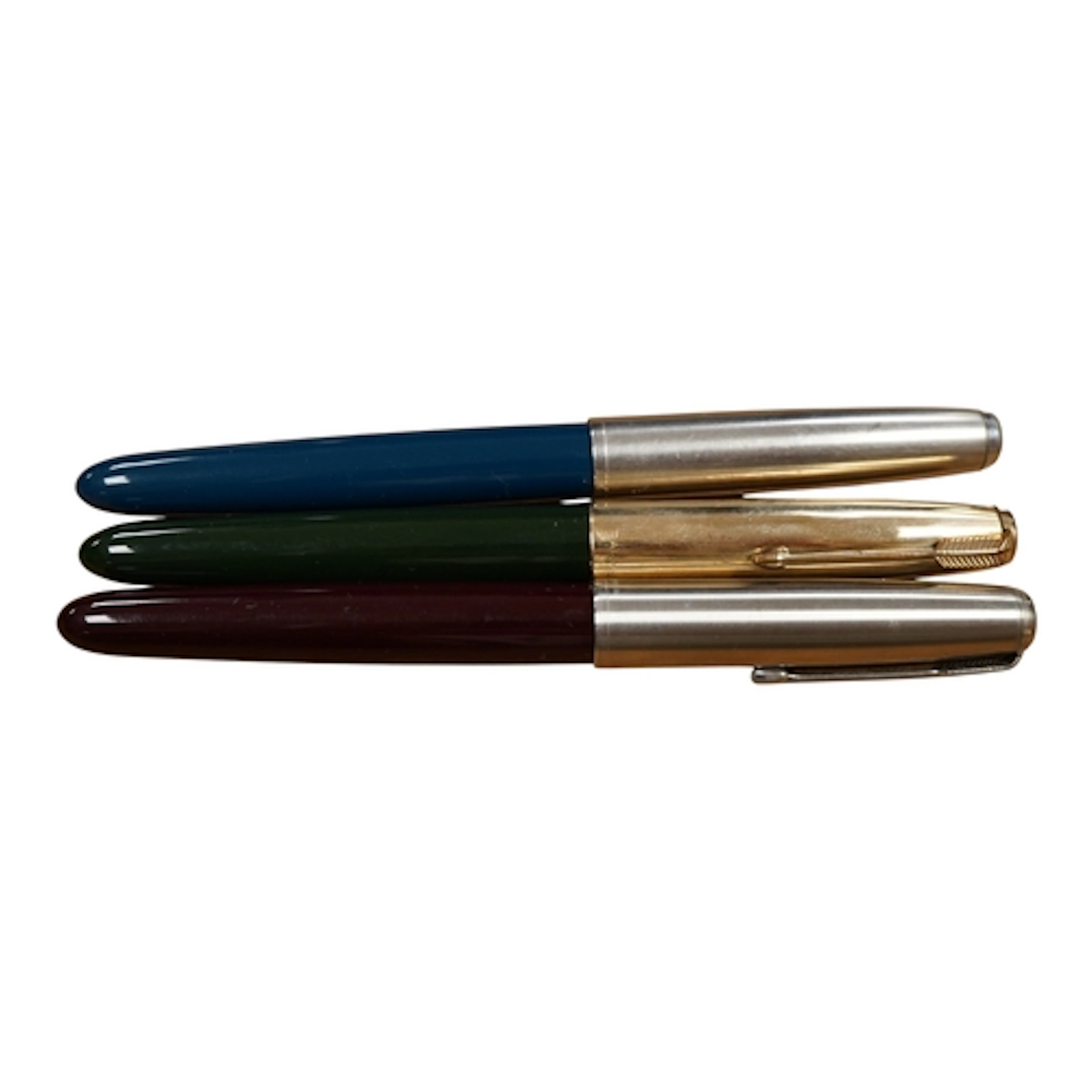 Three Parker '51' specials in forest green, burgundy and tea...