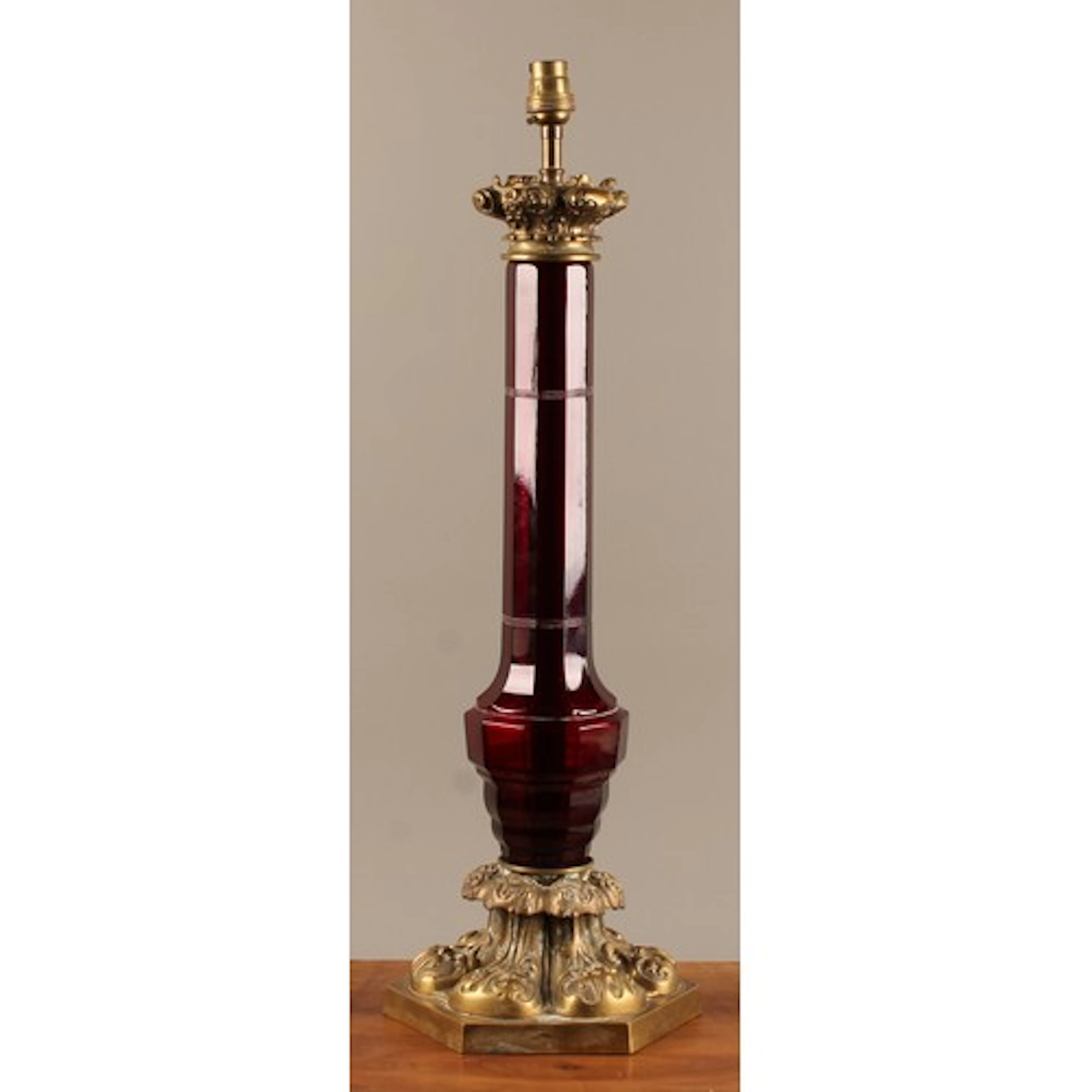 A mid 20th century ruby glass and bronze table lamp, attribu...