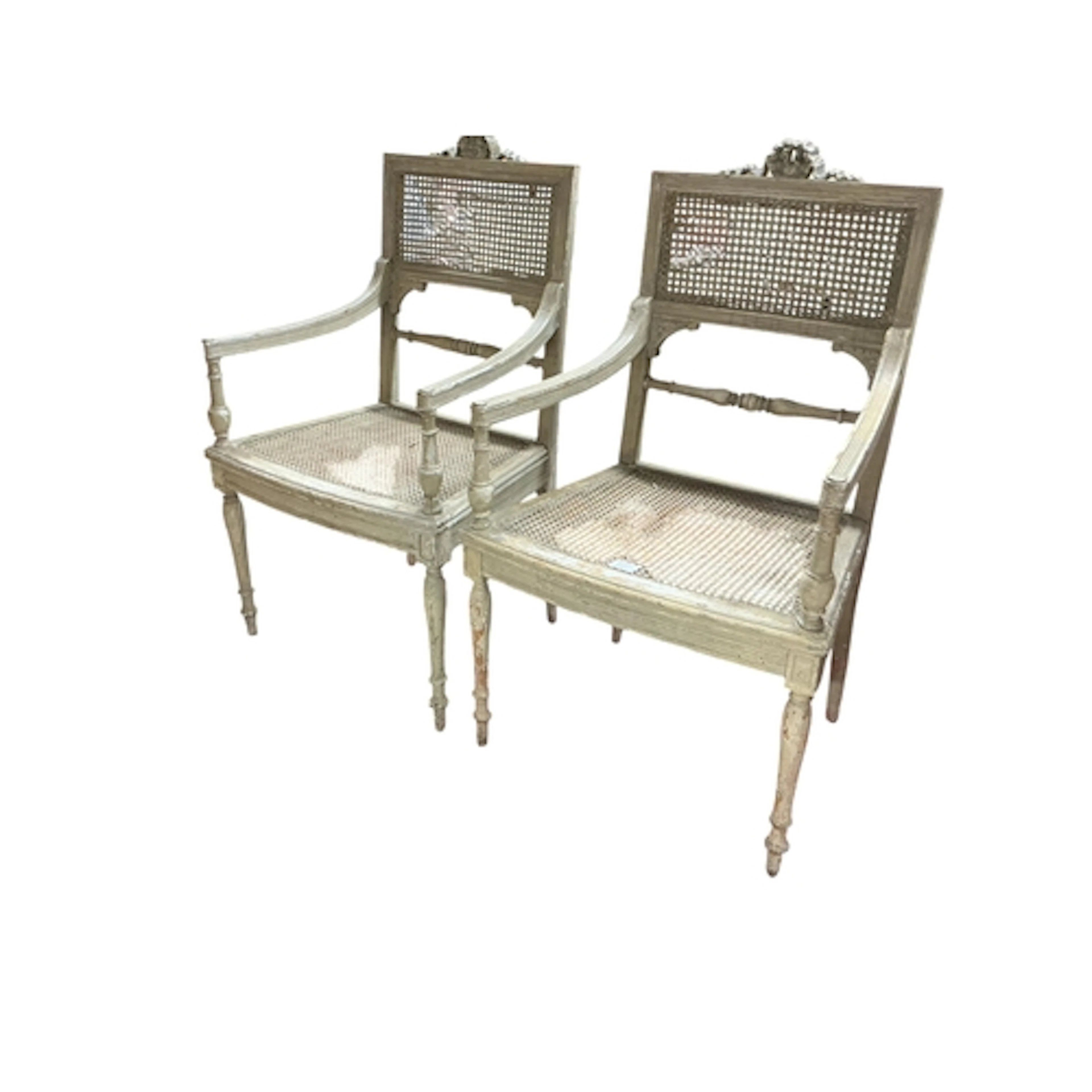 A pair of early 20th century French Louis XVI style caned el...
