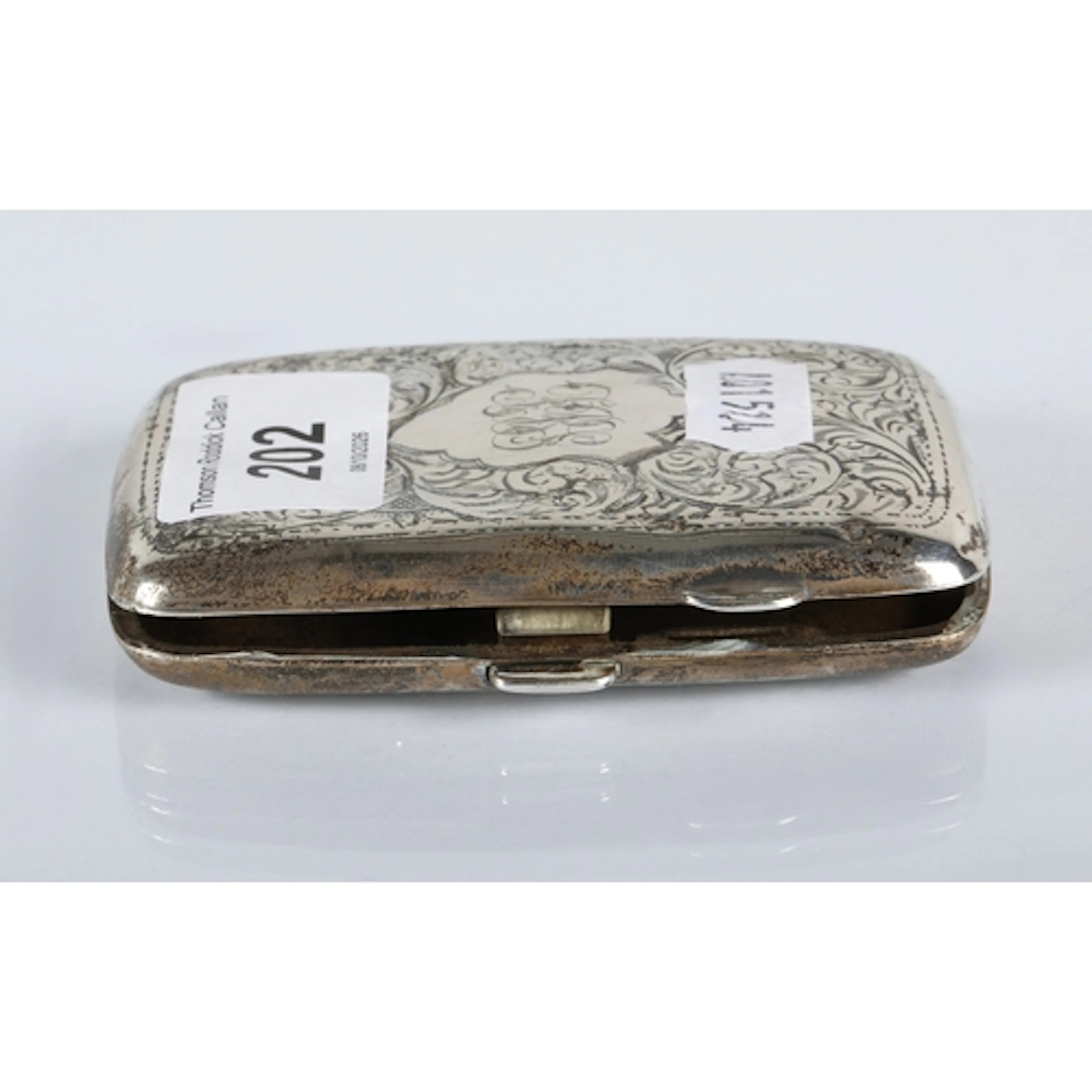 Silver engraved cigarette case, gross weight 52.4g.