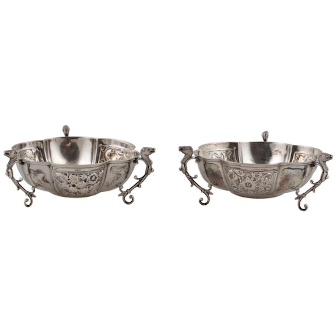 A cased pair of late Victorian silver tri-handled sweetmeat ...