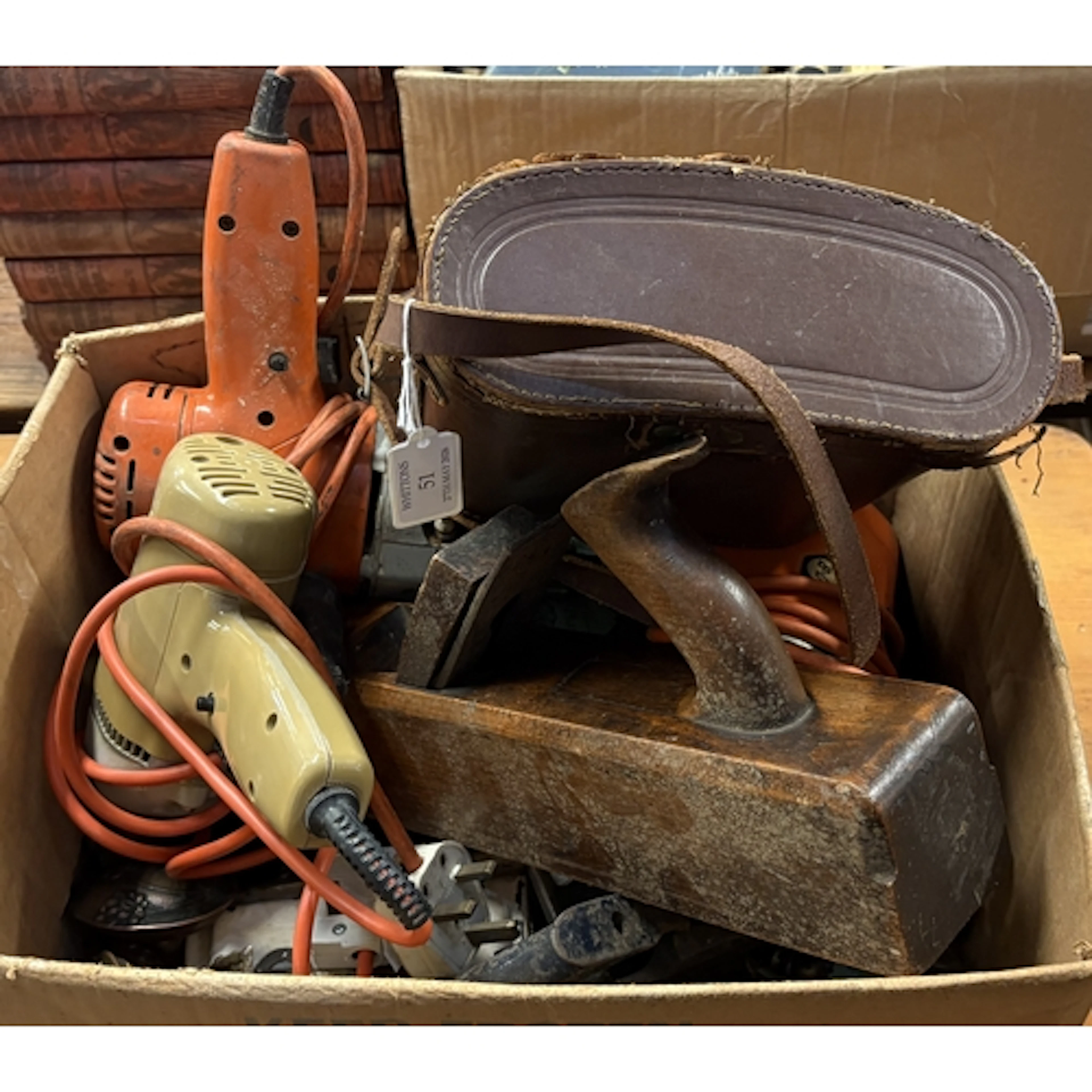 A box containing various old tools, door furniture, binocula...