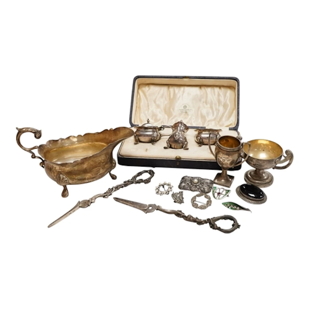 A George VI silver sauceboat, with flying scroll handle, Edw...