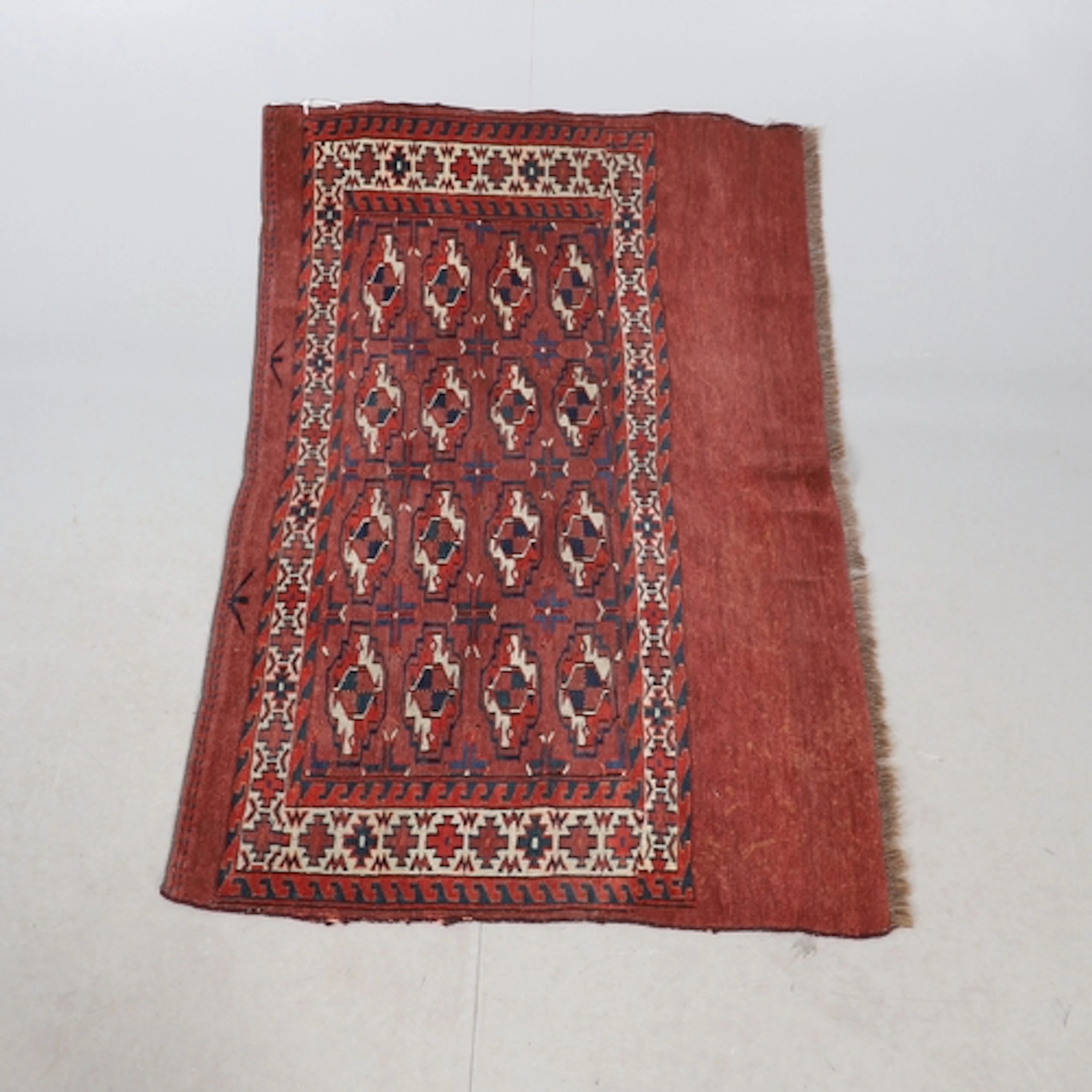 YOMAT TURKMEN CHUVAL. The madder field with sixteen quartere...