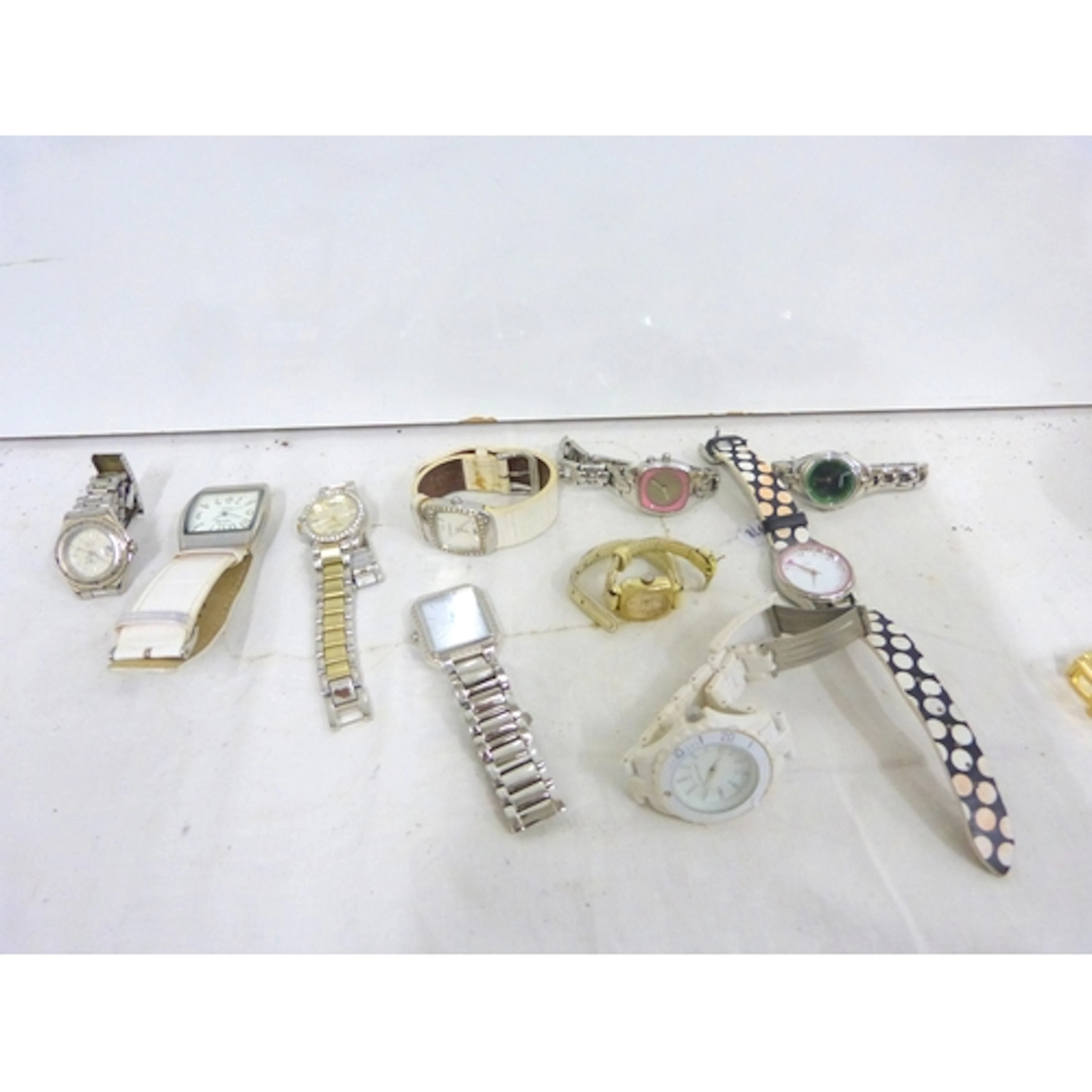 Box of ladies fashion watches to include Next, Fossils etc.