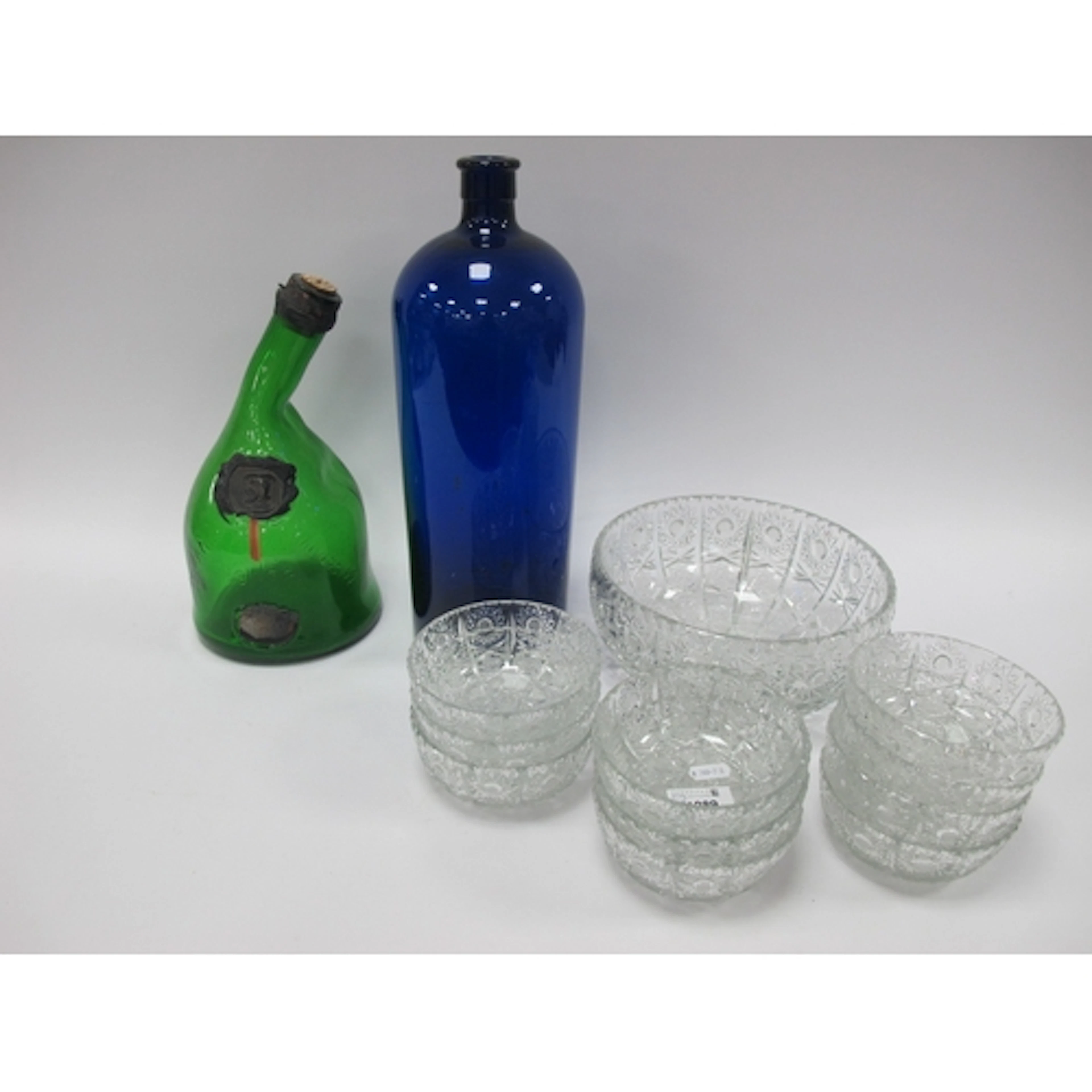 Blue Glass Bottle 37cm high, 1937 wobbly green glass bottle,...