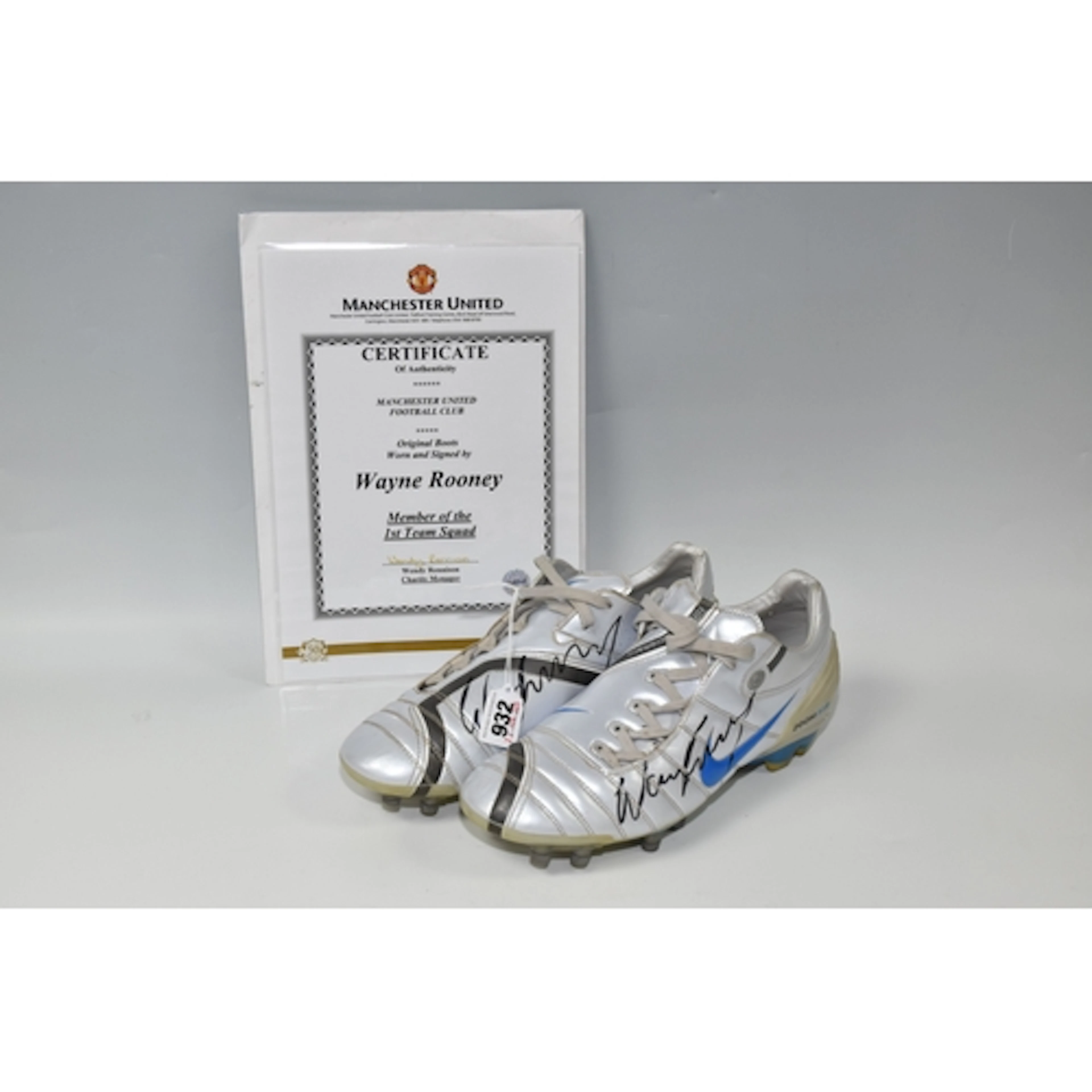 A PAIR OF WAYNE ROONEY WORN & SIGNED FOOTBALL BOOTS along wi...