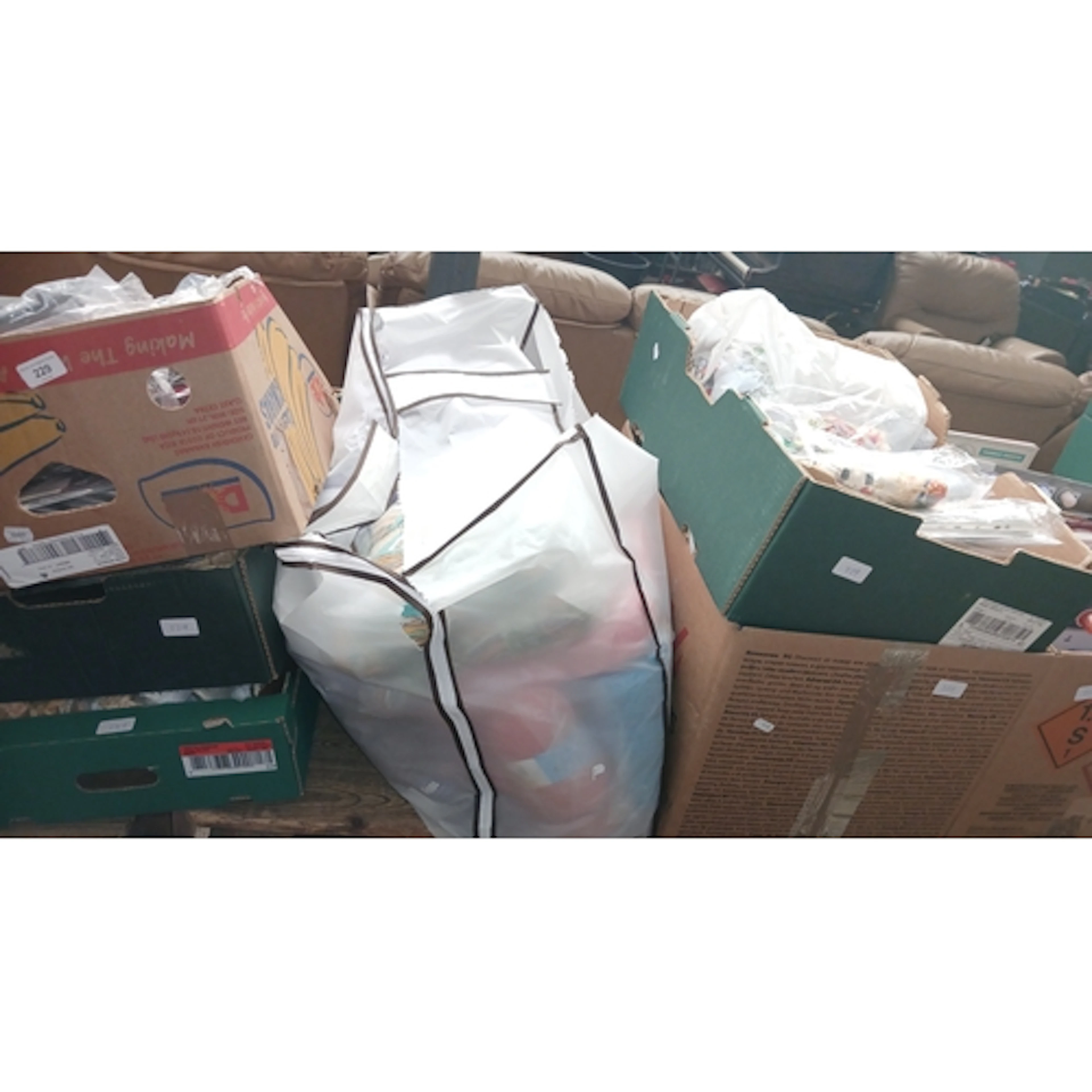A mixed lot comprising 6 boxes together with a large bag of ...
