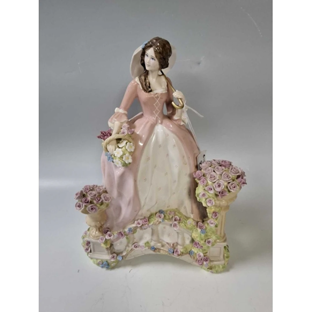 A LIMITED EDITION FINE BONE CHINA FIGURINE TITLED 'SPRING EN...