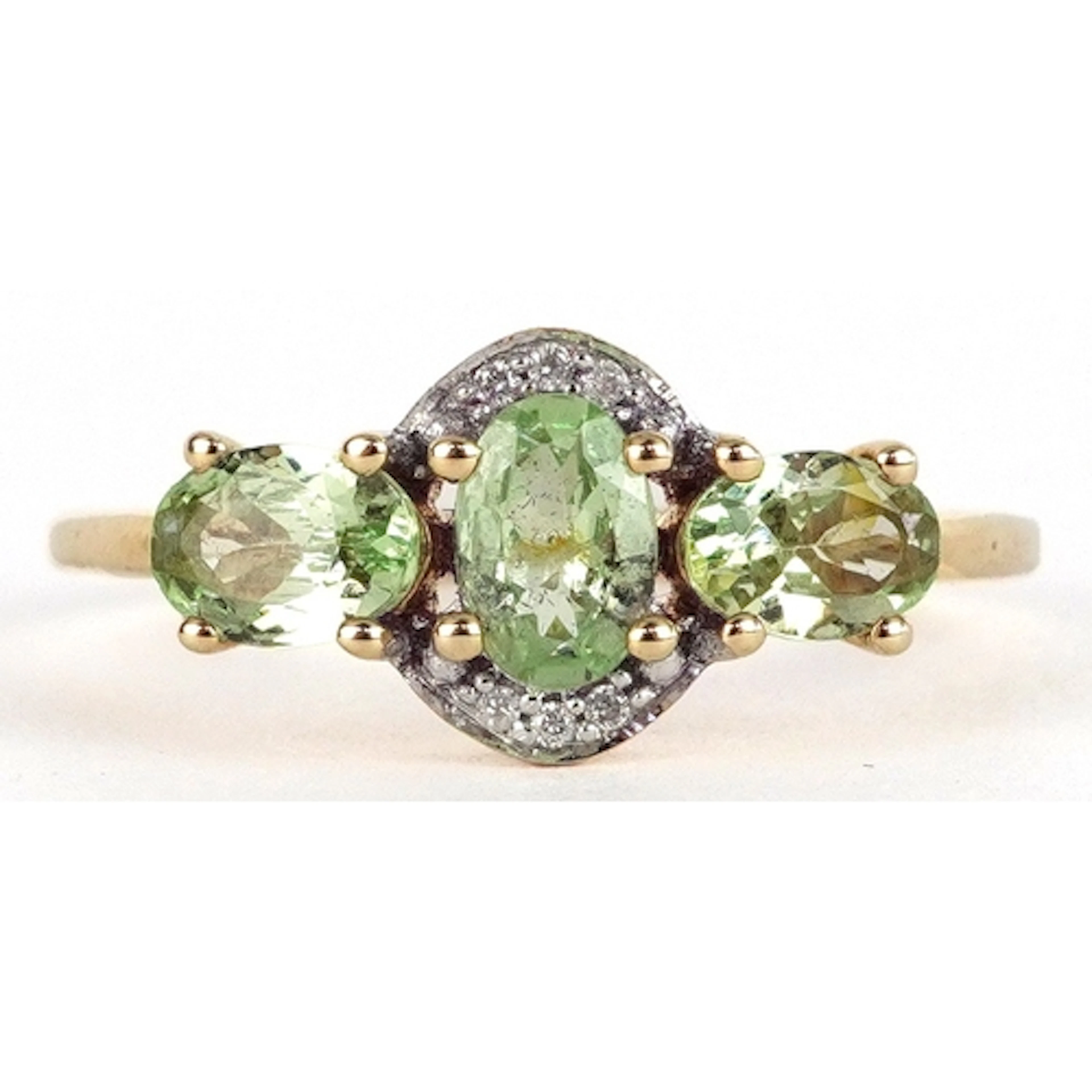 10k gold diamond and green stone ring, possibly peridot, siz...
