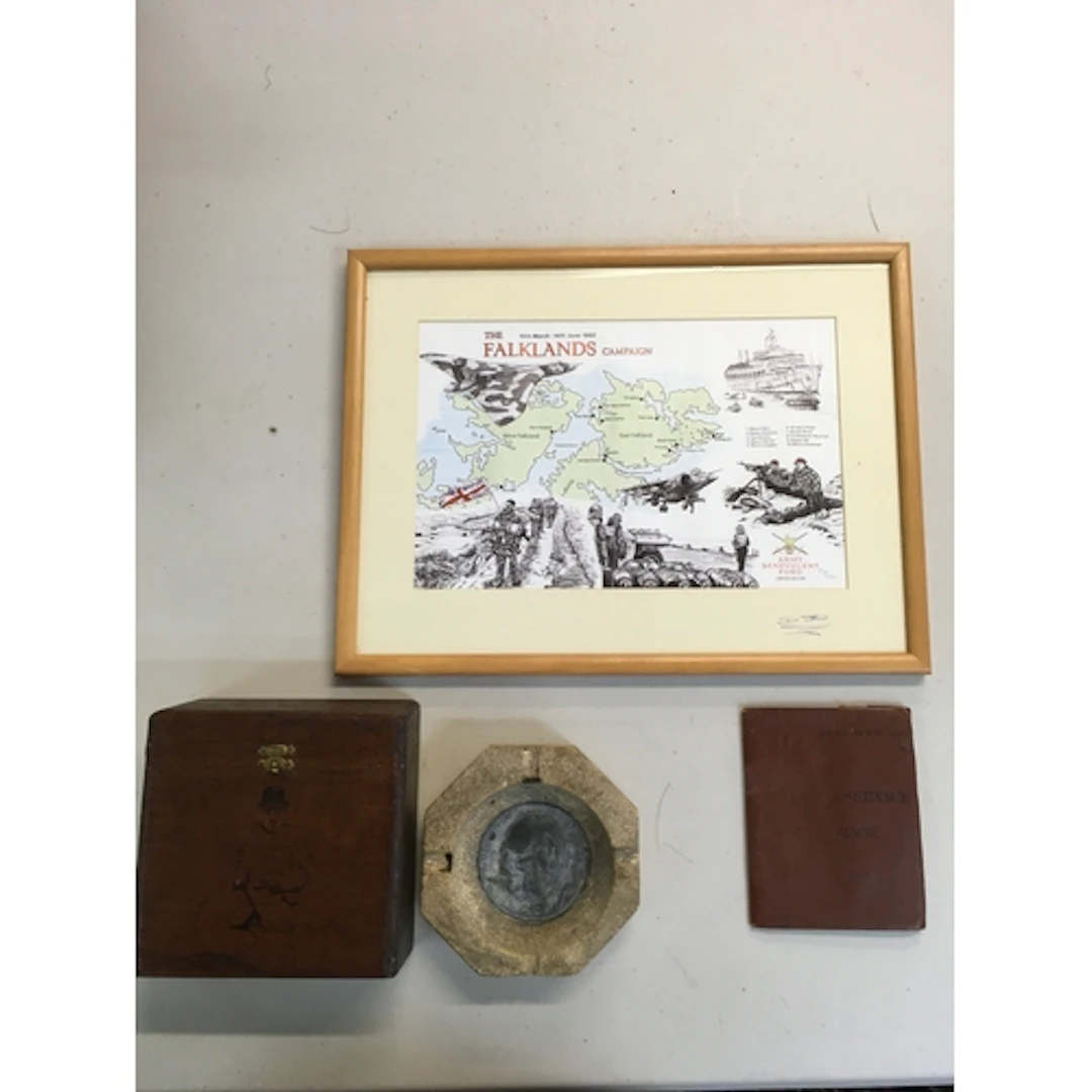 Falklands map, Paybook, and a octagonal stone featuring a Ch...