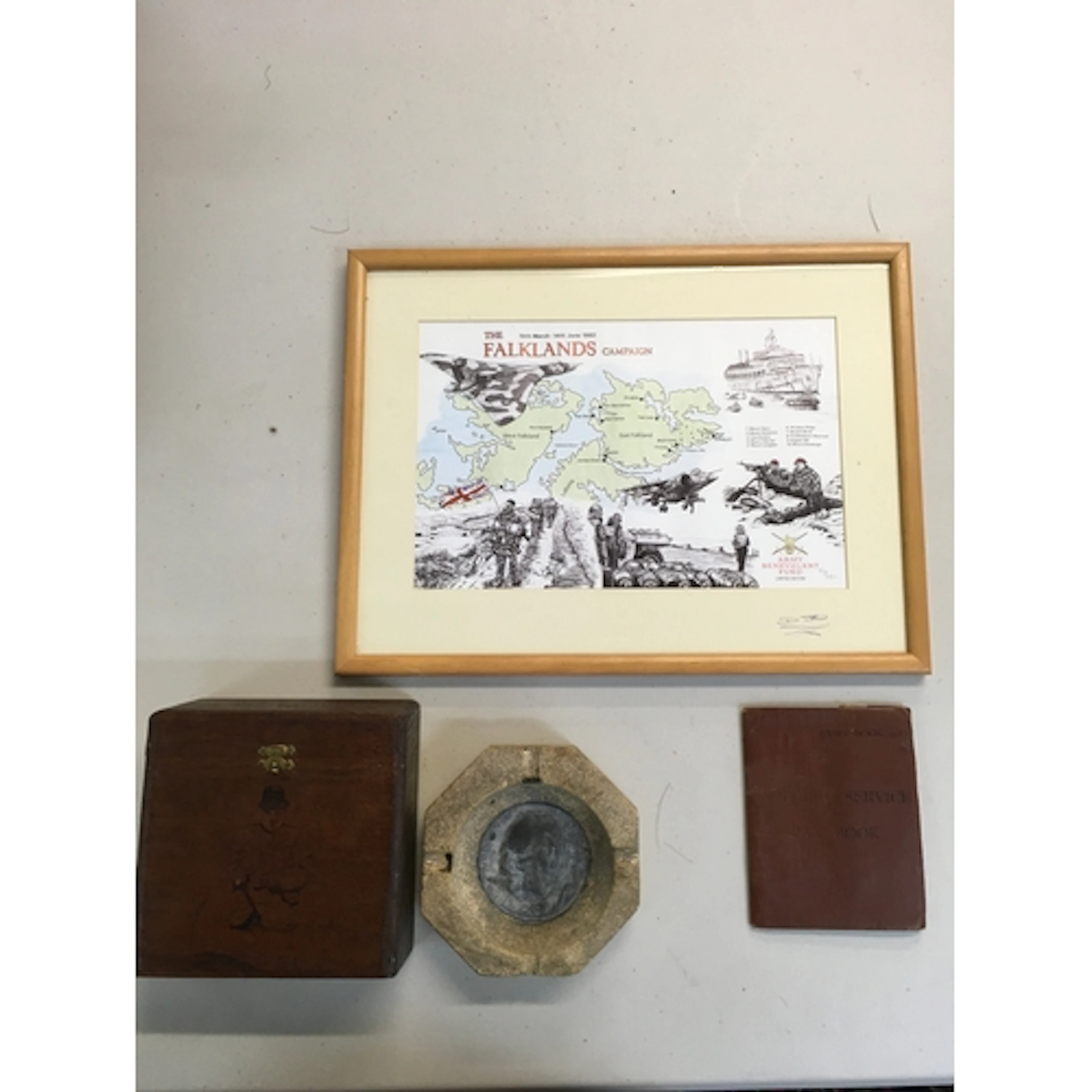 Falklands map, Paybook, and a octagonal stone featuring a Ch...