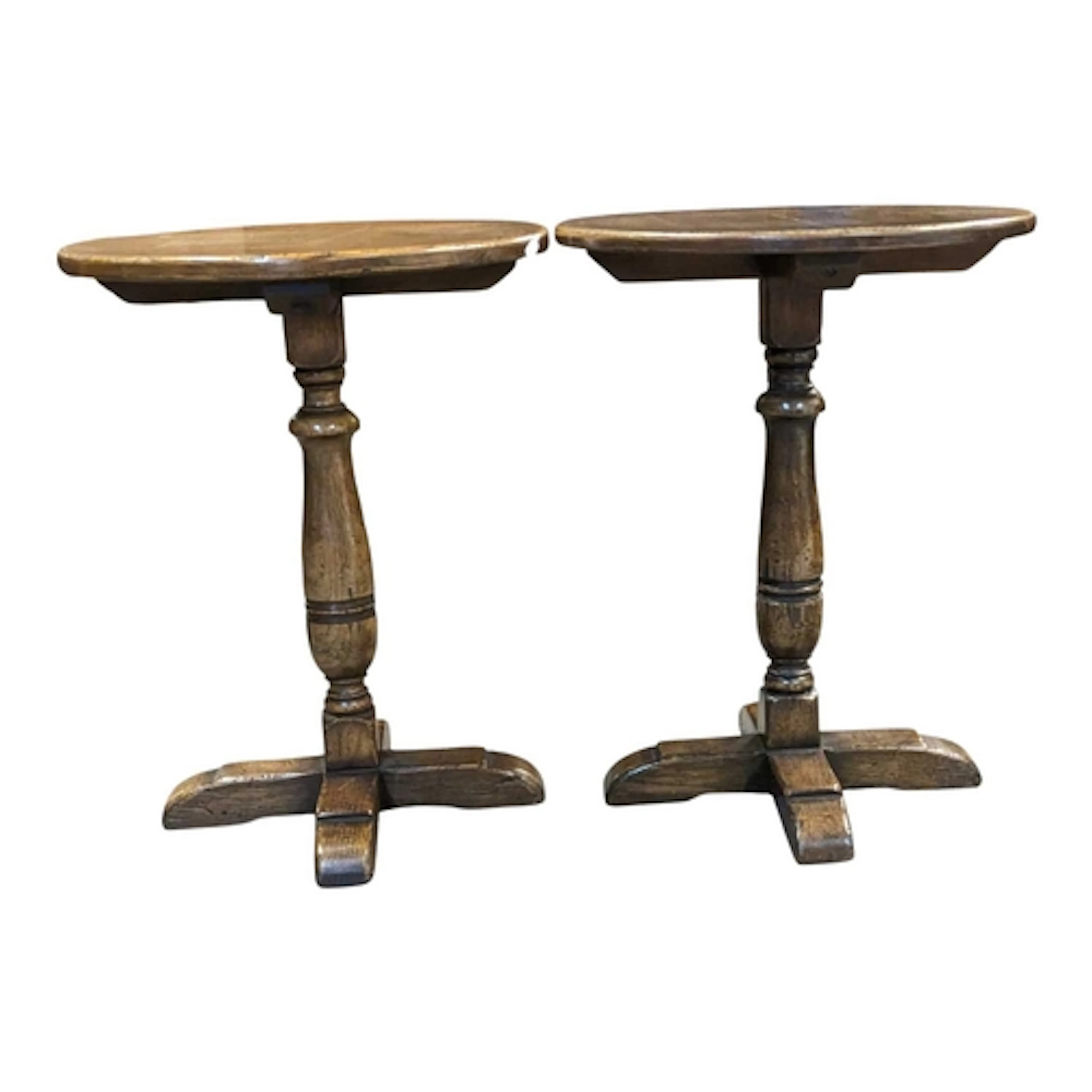 A pair of Jacobean revival Ipswich oak pedestal side tables....