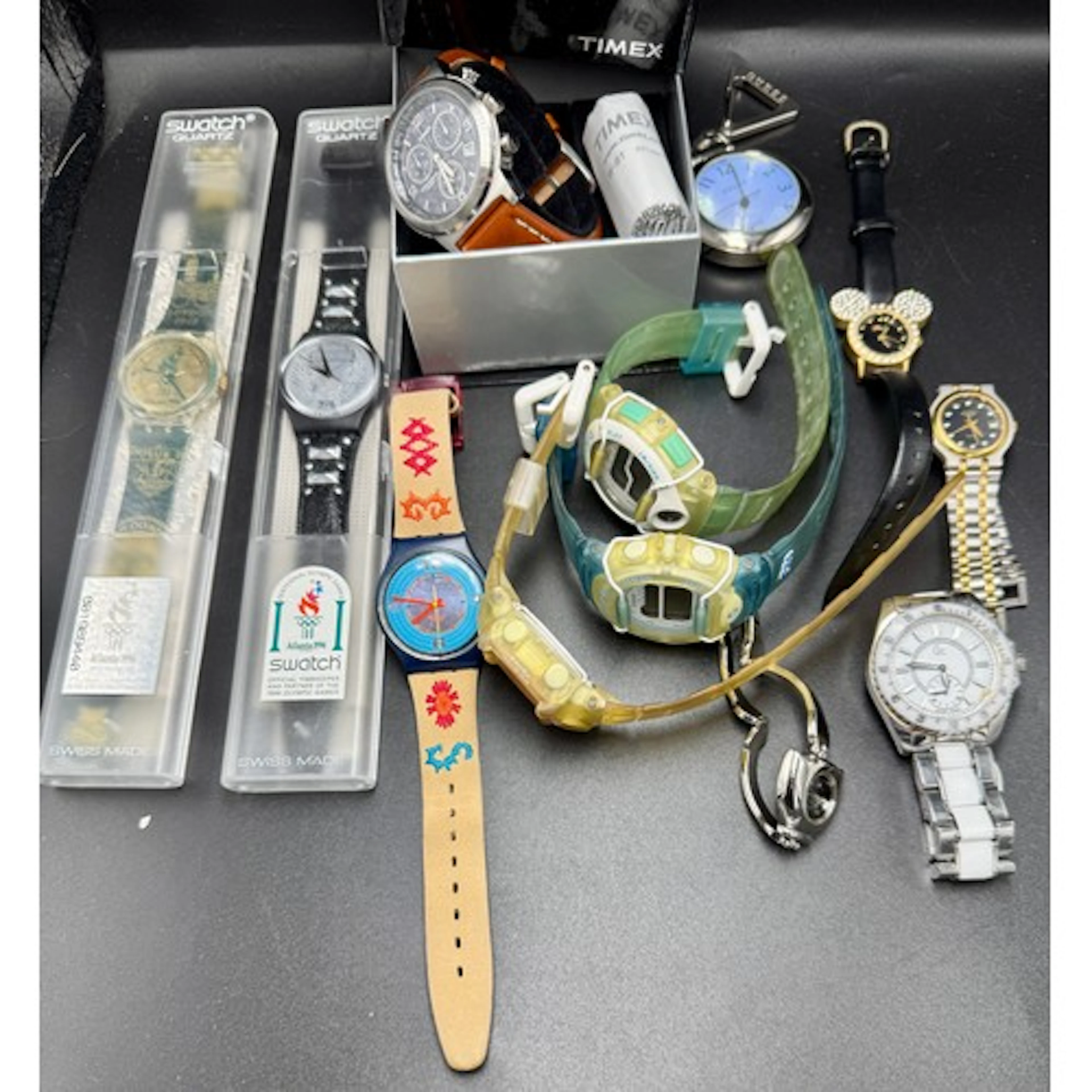 A collection of vintage wristwatches to include Swatch Atlan...