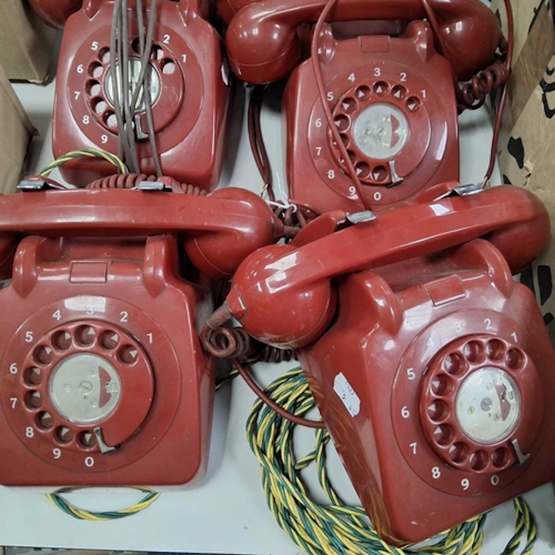 FOUR RED GPO 706 TELEPHONES all with rotary dials (centrepie...