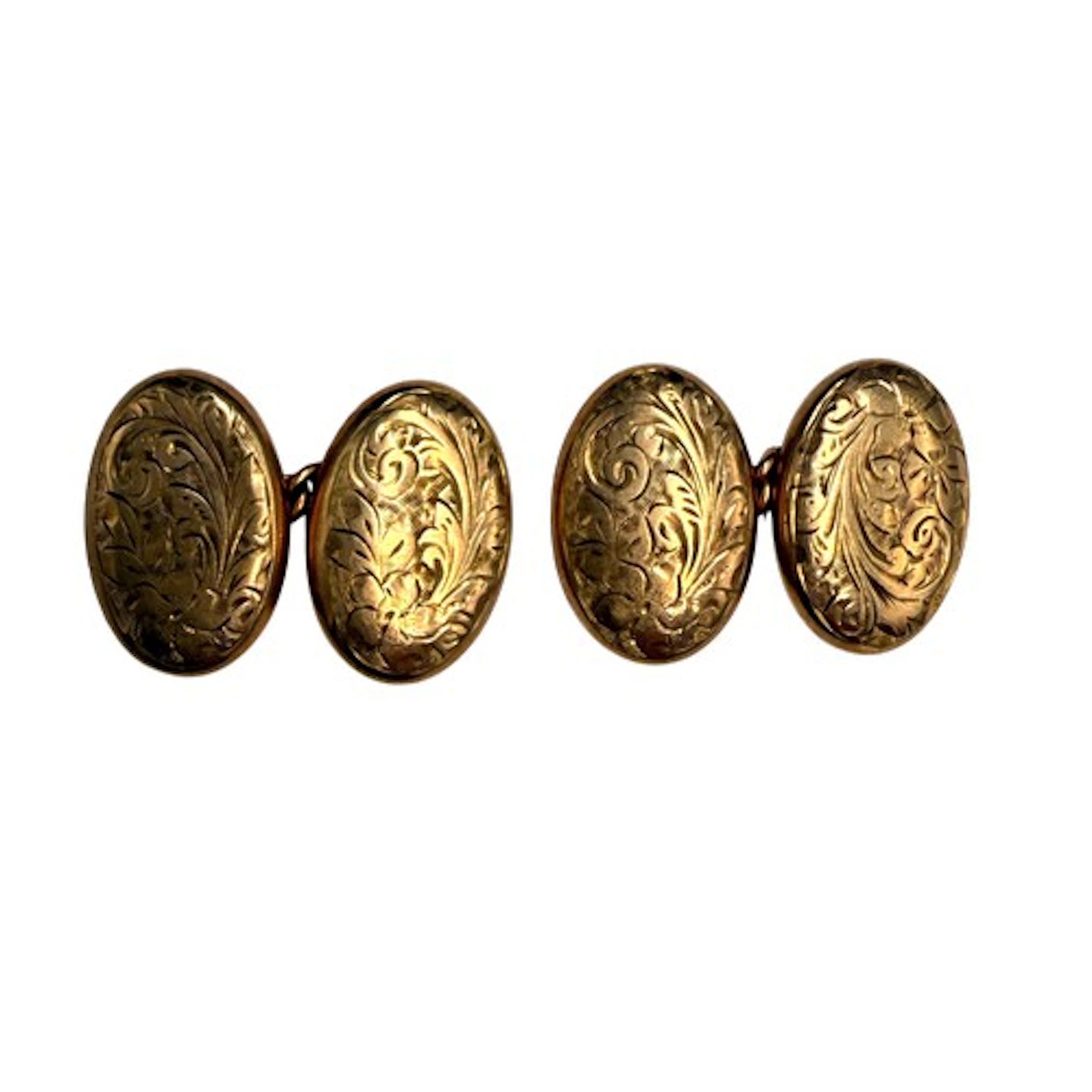 A pair of 9 carat gold cufflinks with foliate scroll engravi...