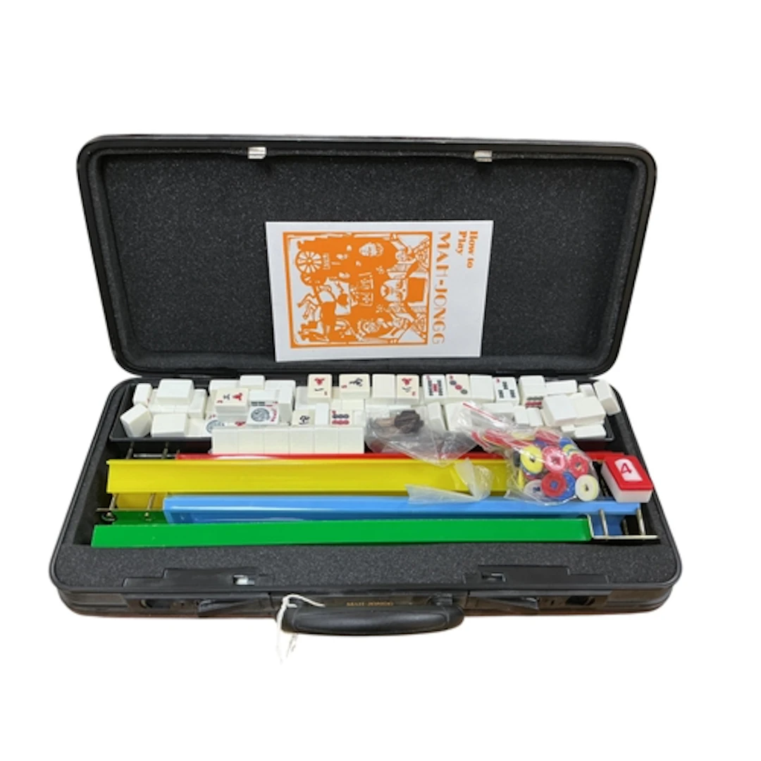 A cased composition Mah Yong set.