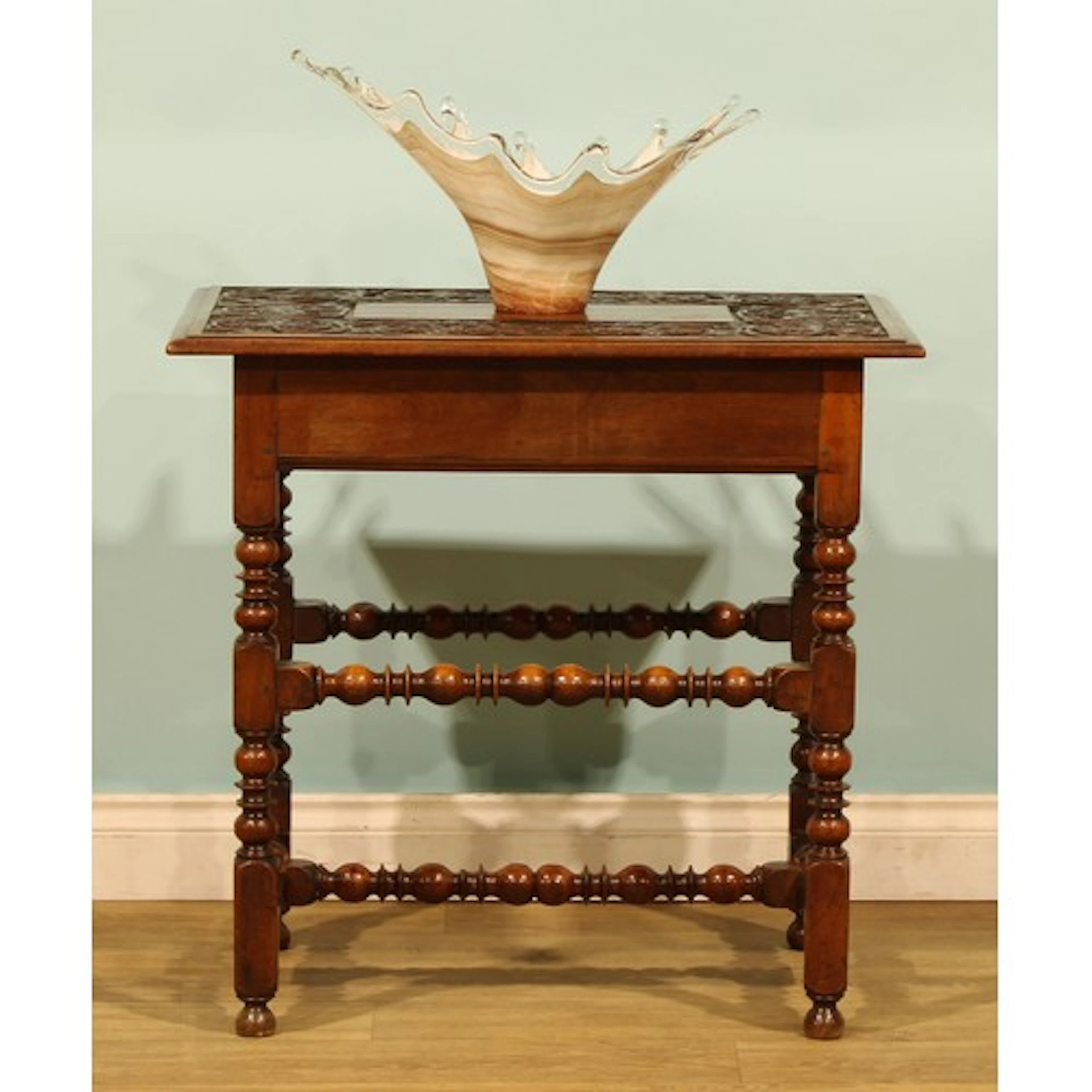An 18th century and later walnut centre table, later rectang...