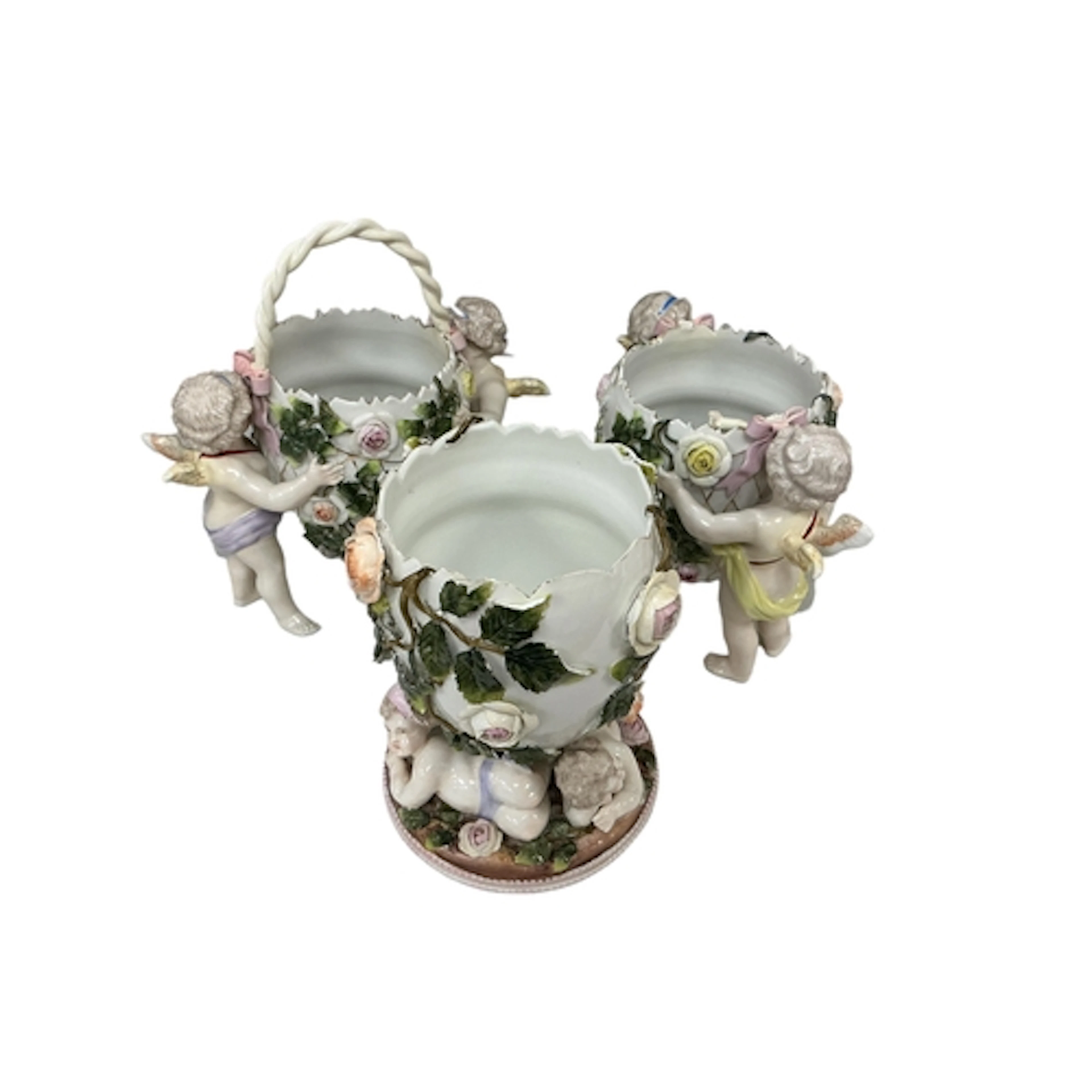 A Sitzendorf floral encrusted cherub and egg porcelain centr...