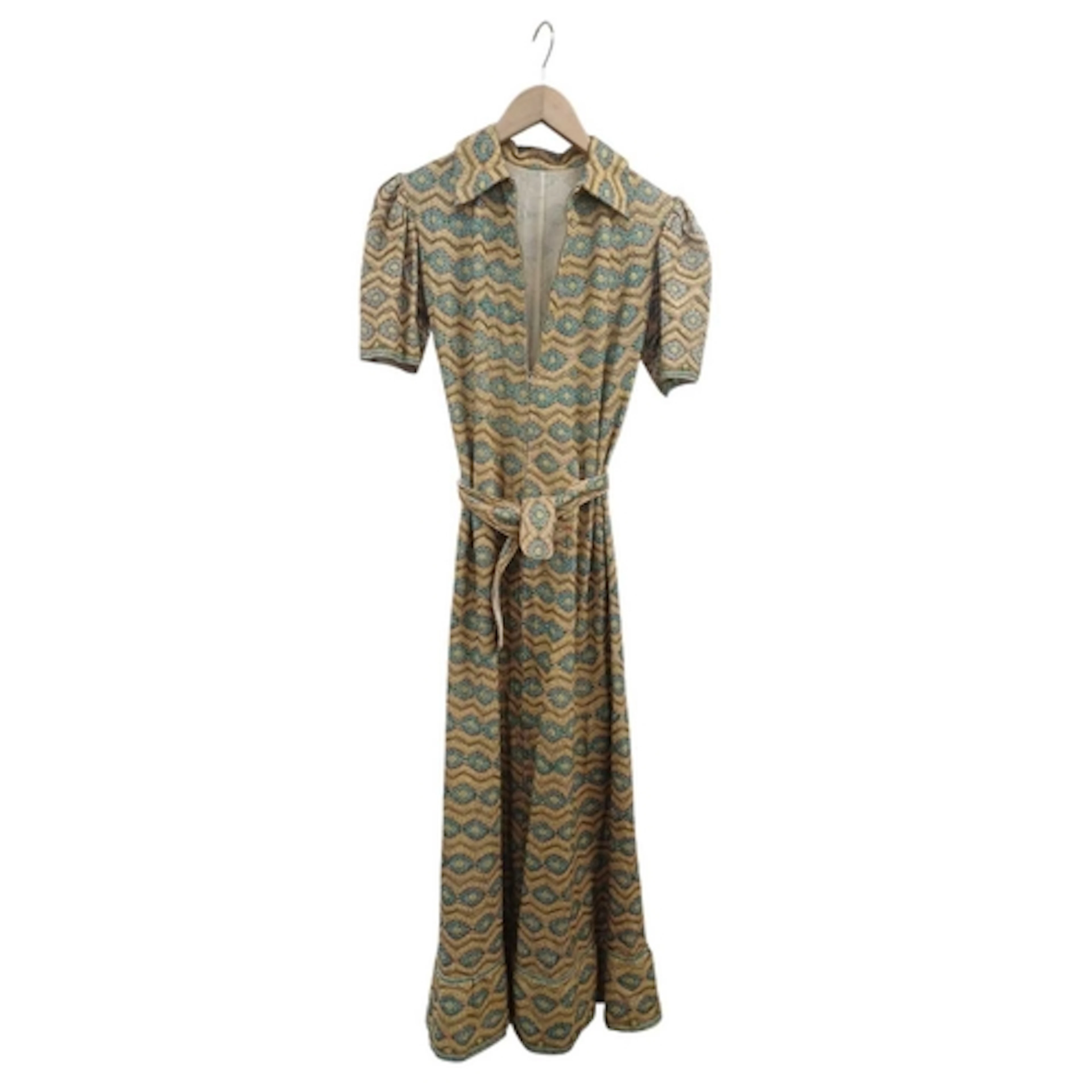 A vintage Indian embroidered belted day dress. Featuring a g...
