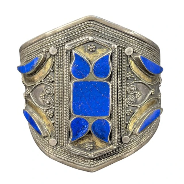 A middle eastern or tribal silver and mixed metal cuff brace...
