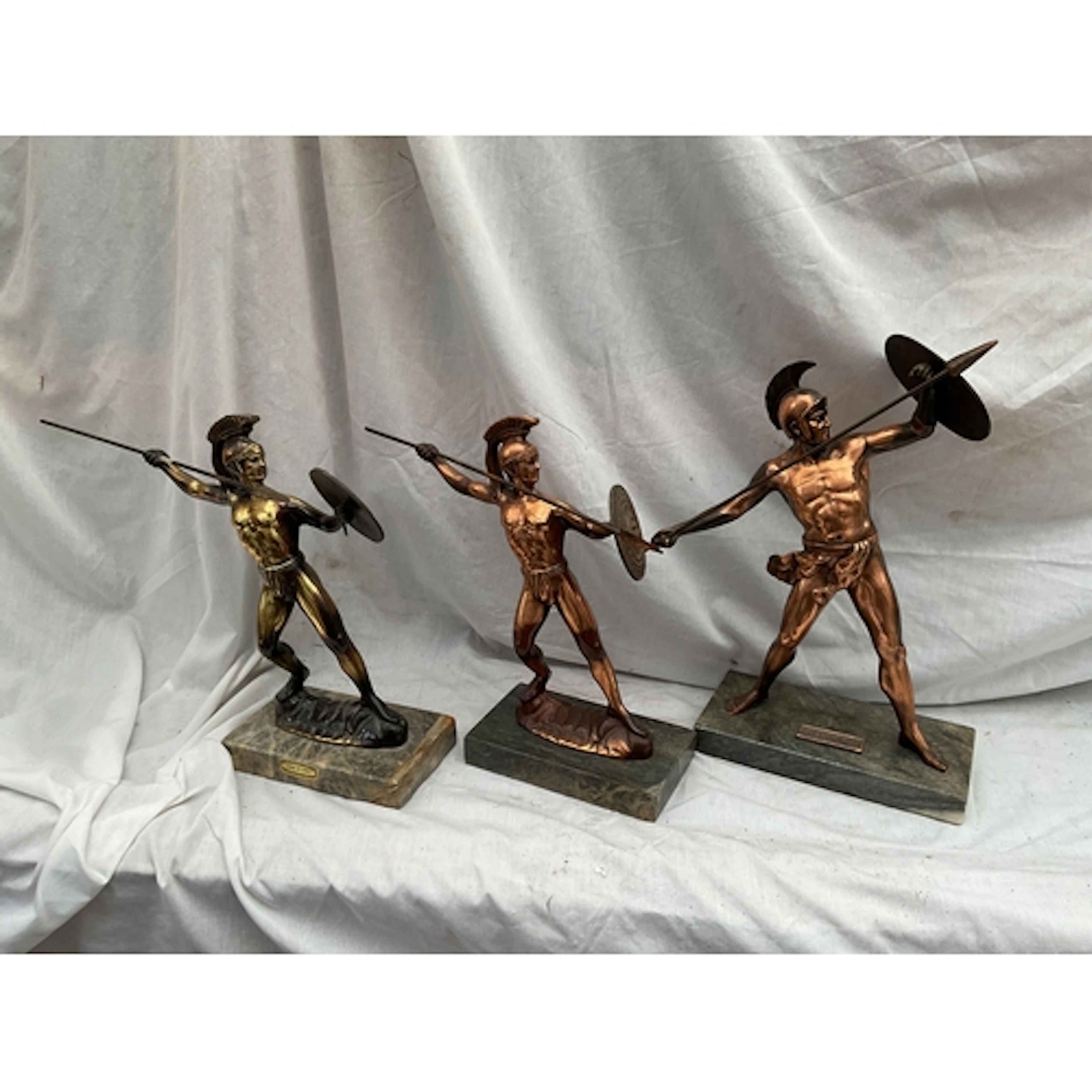 Three Greek Warrior figures on is named as Achilles.on marbl...
