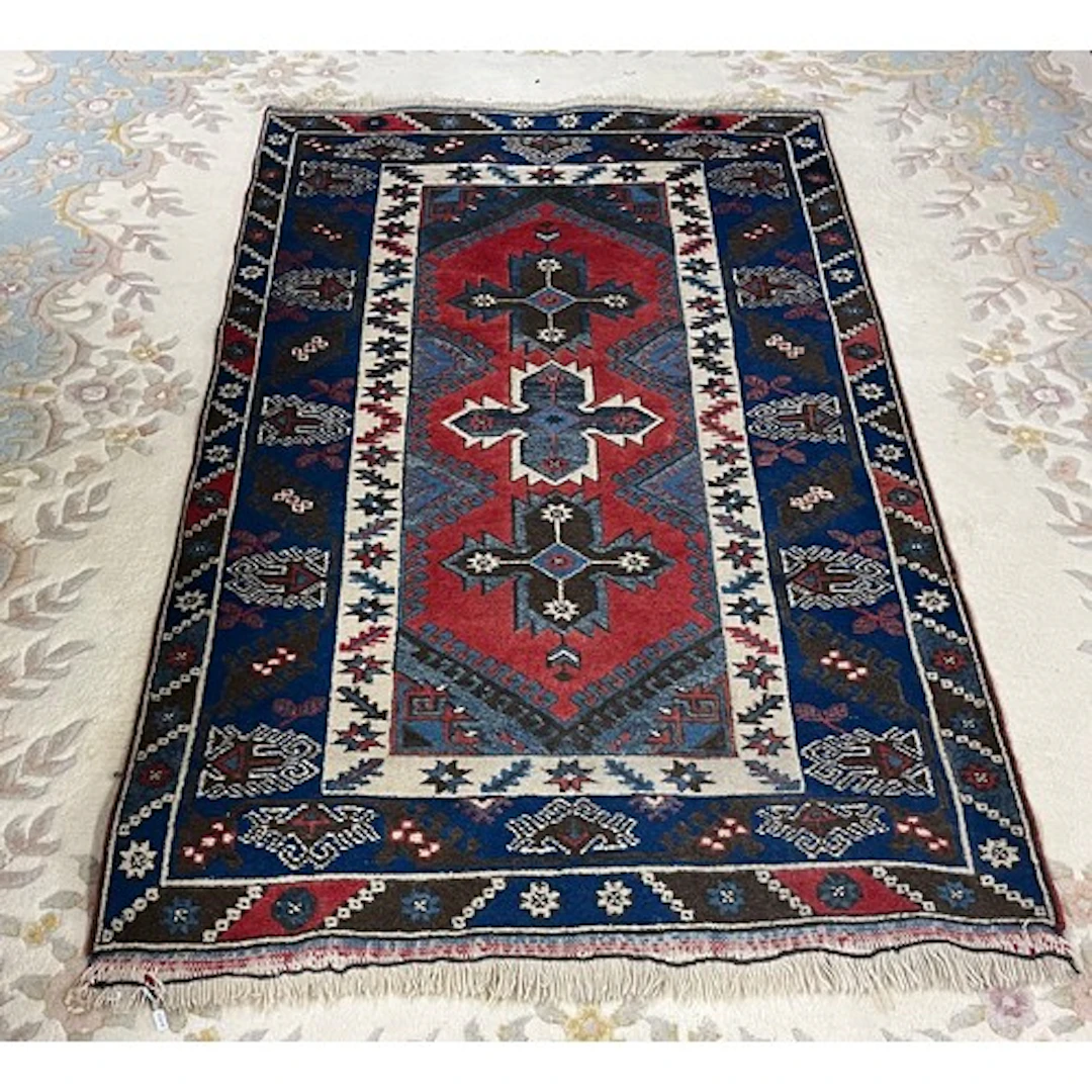 Blue and red patterned rug