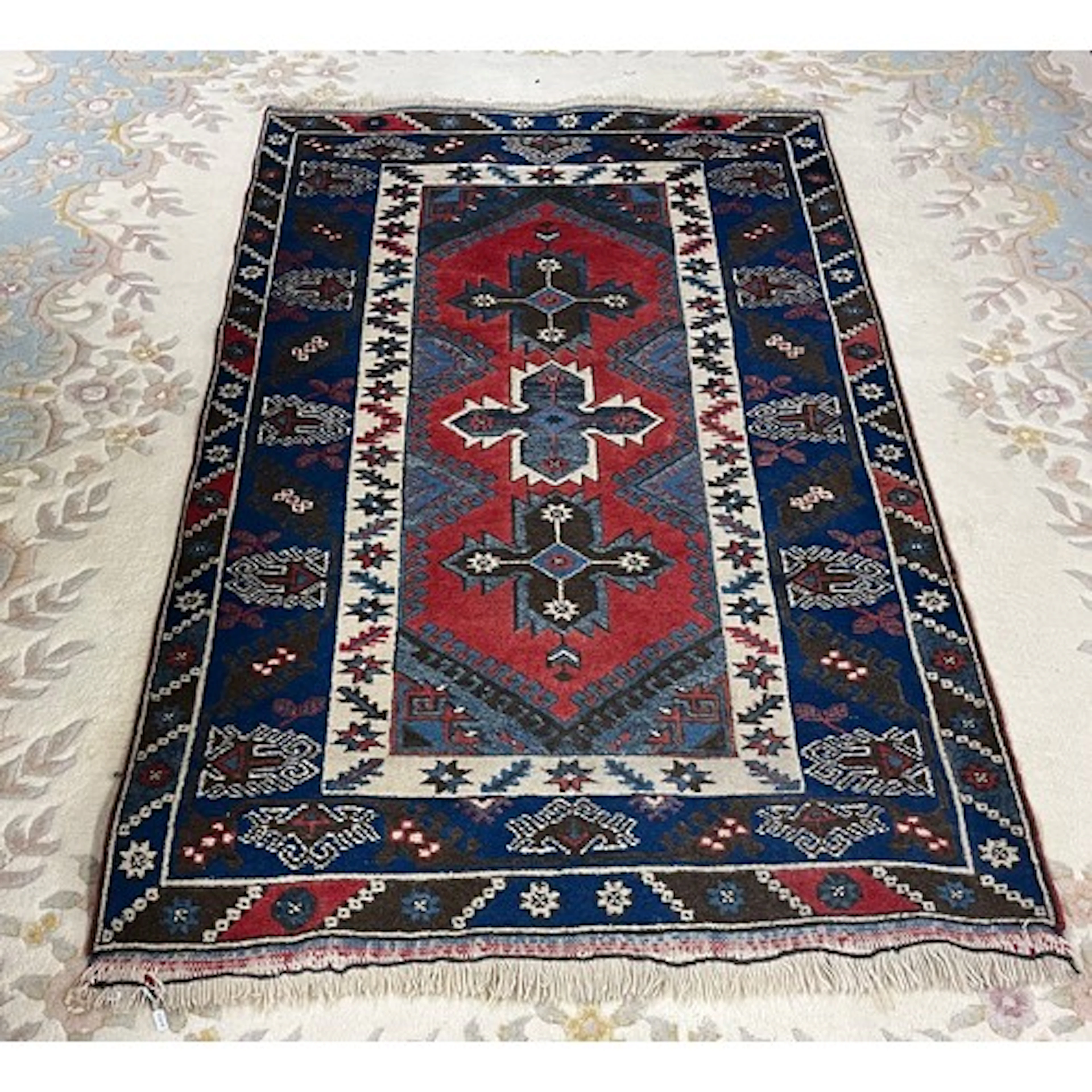 Blue and red patterned rug