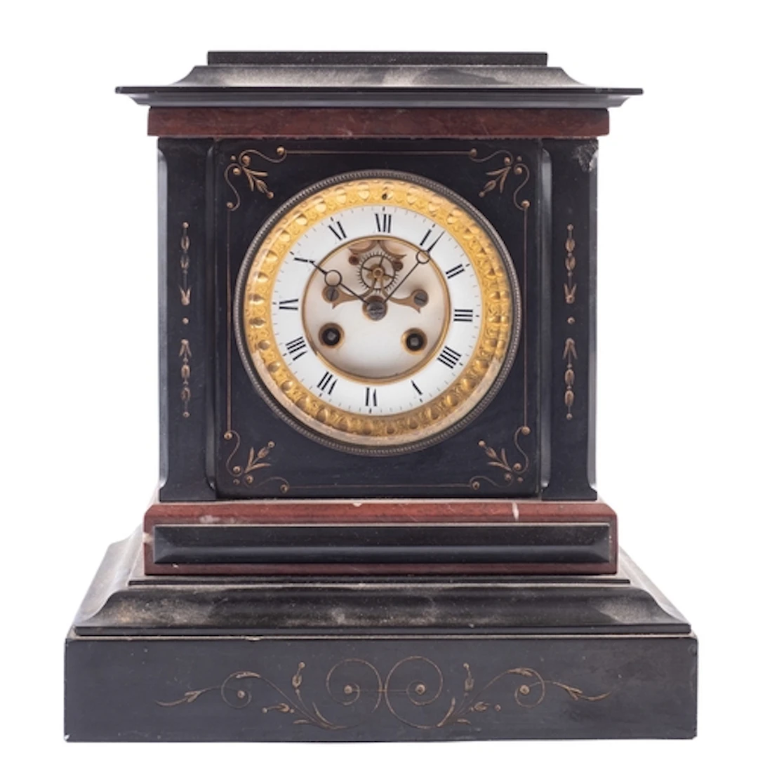 A late-Victorian French black marble mantel clock with visib...