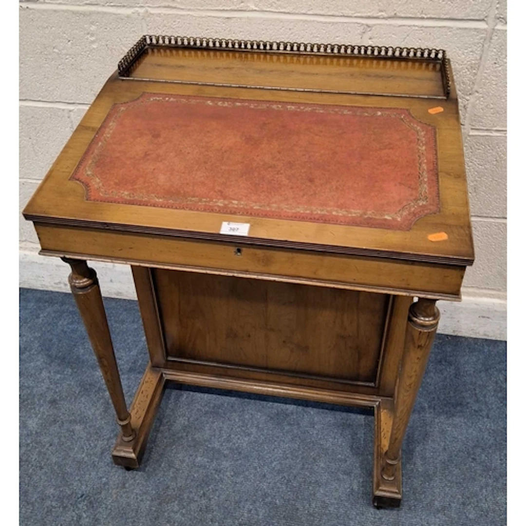 A REPRODUCTION YEW WOOD DAVENPORT, with a raised brass galle...