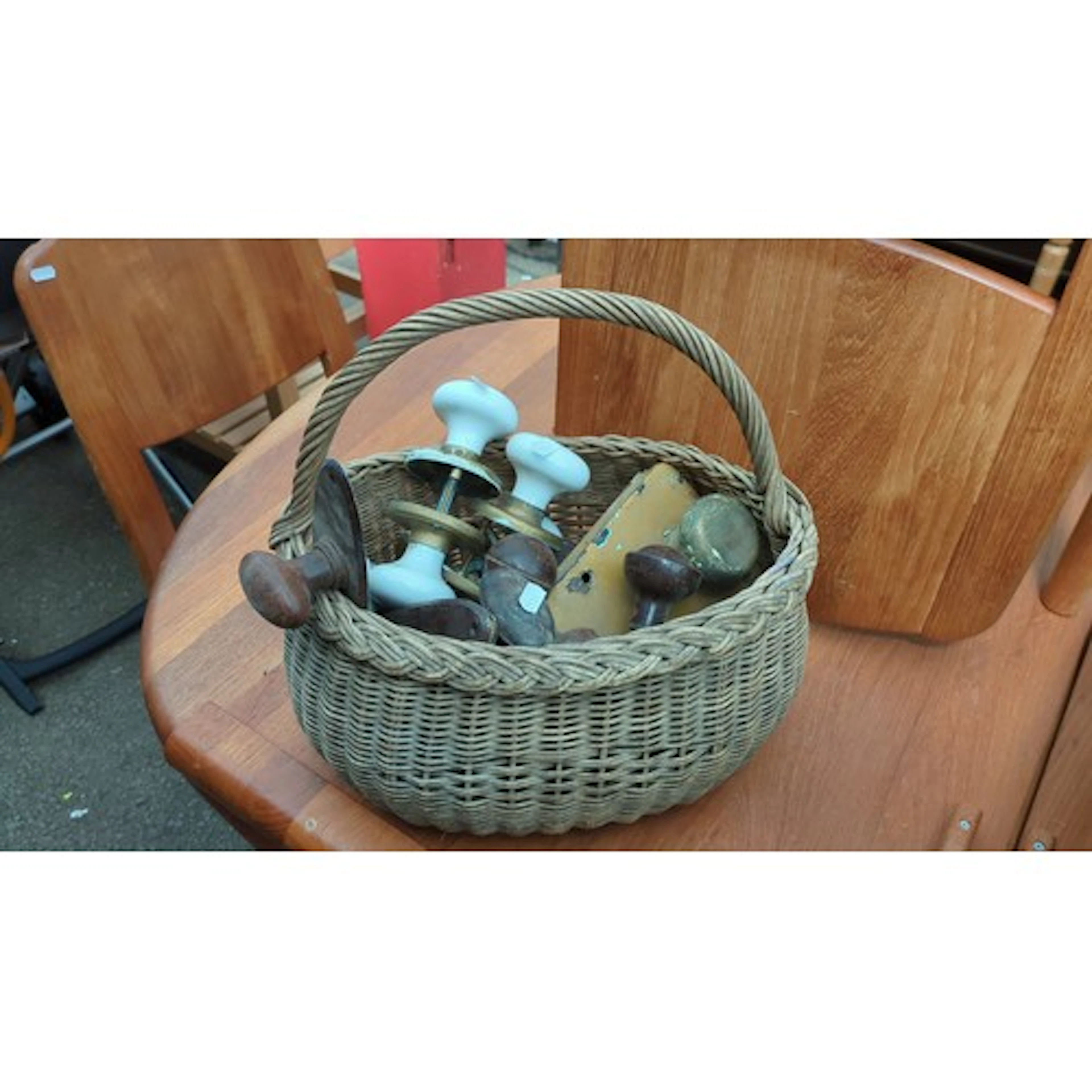 An assorted group of door furniture including ceramic, brass...