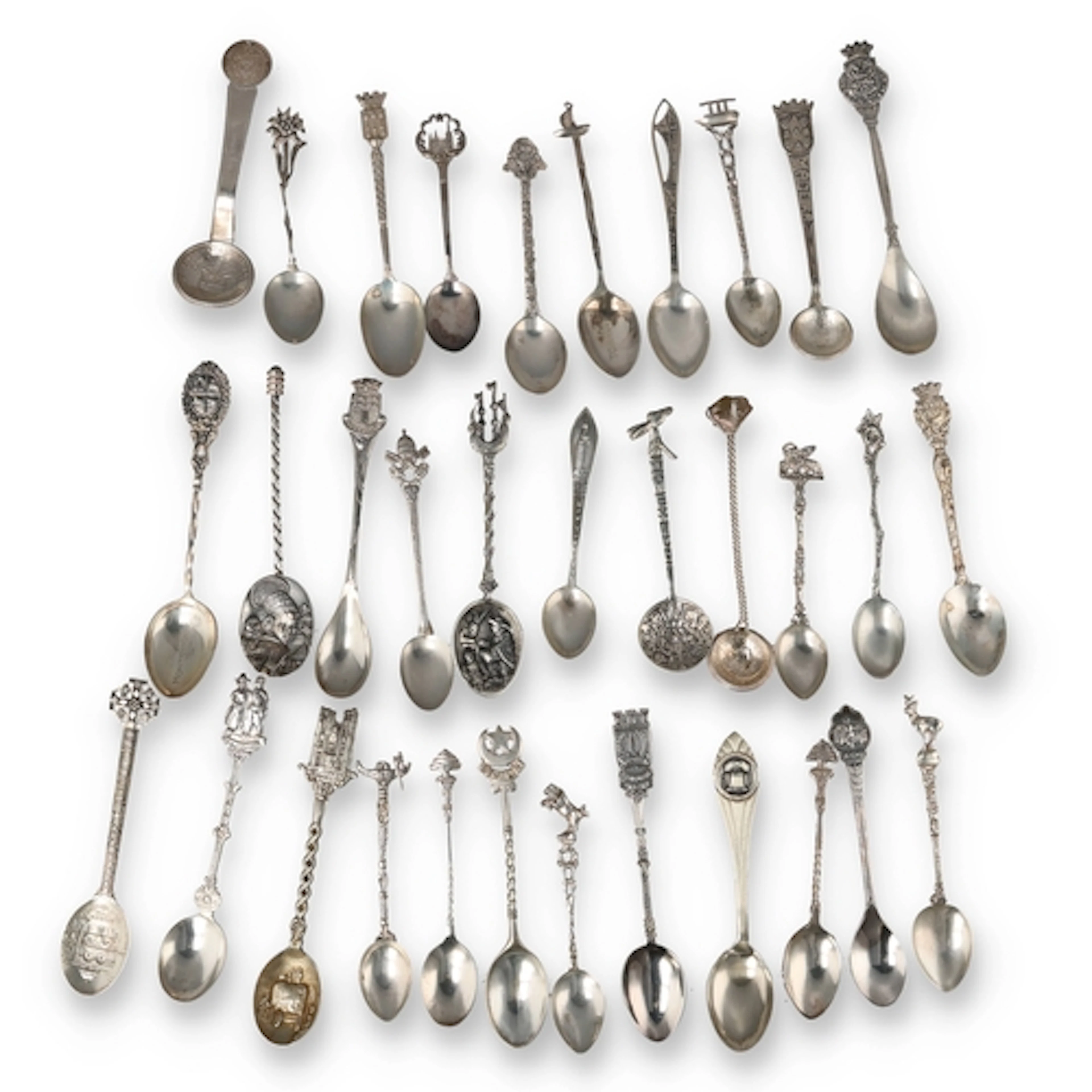 A COLLECTION OF THIRTY THREE EUROPEAN AND WORLD SILVER SOUVE...