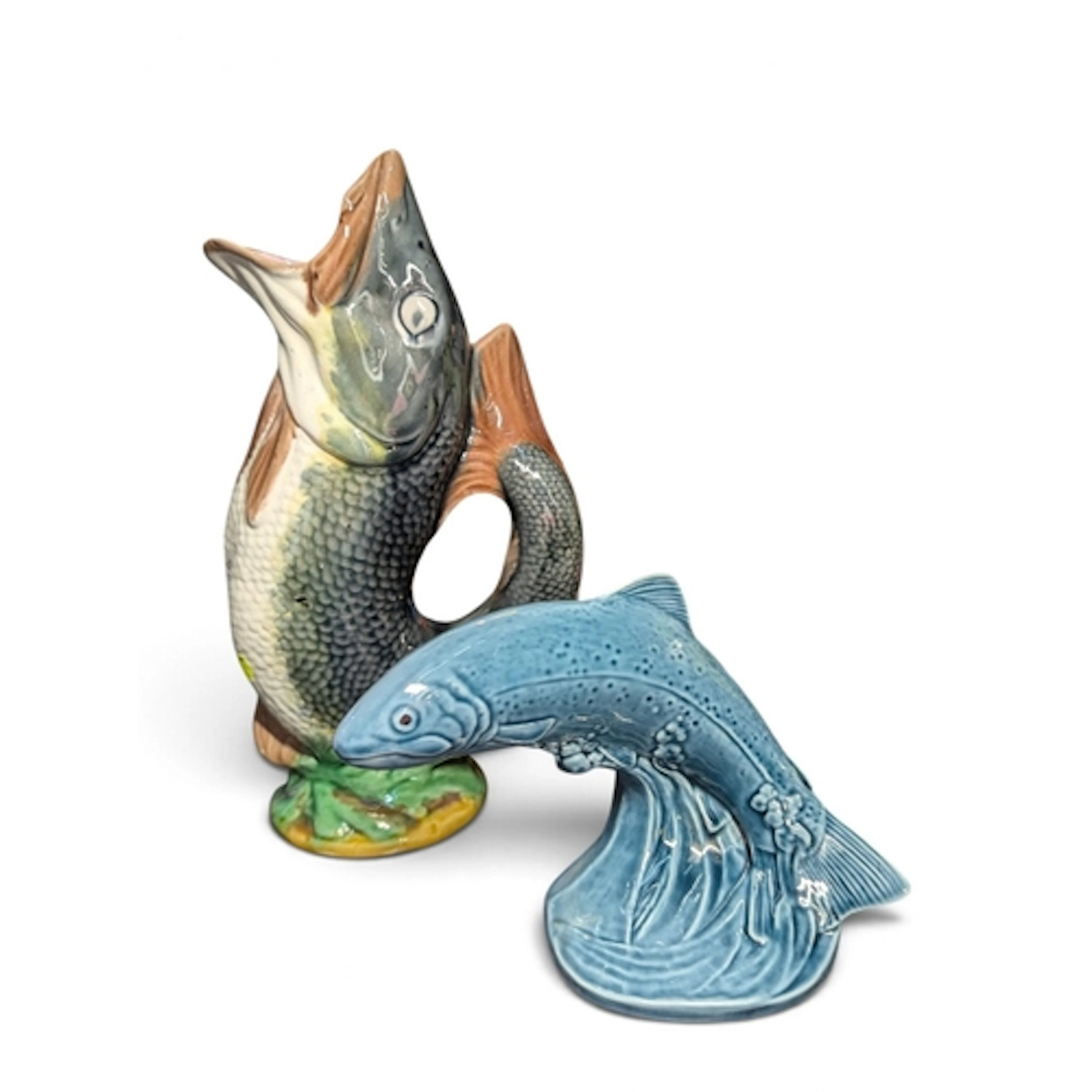 Majolica gluggle jug, ht. 17cm together with a Poole Pottery...