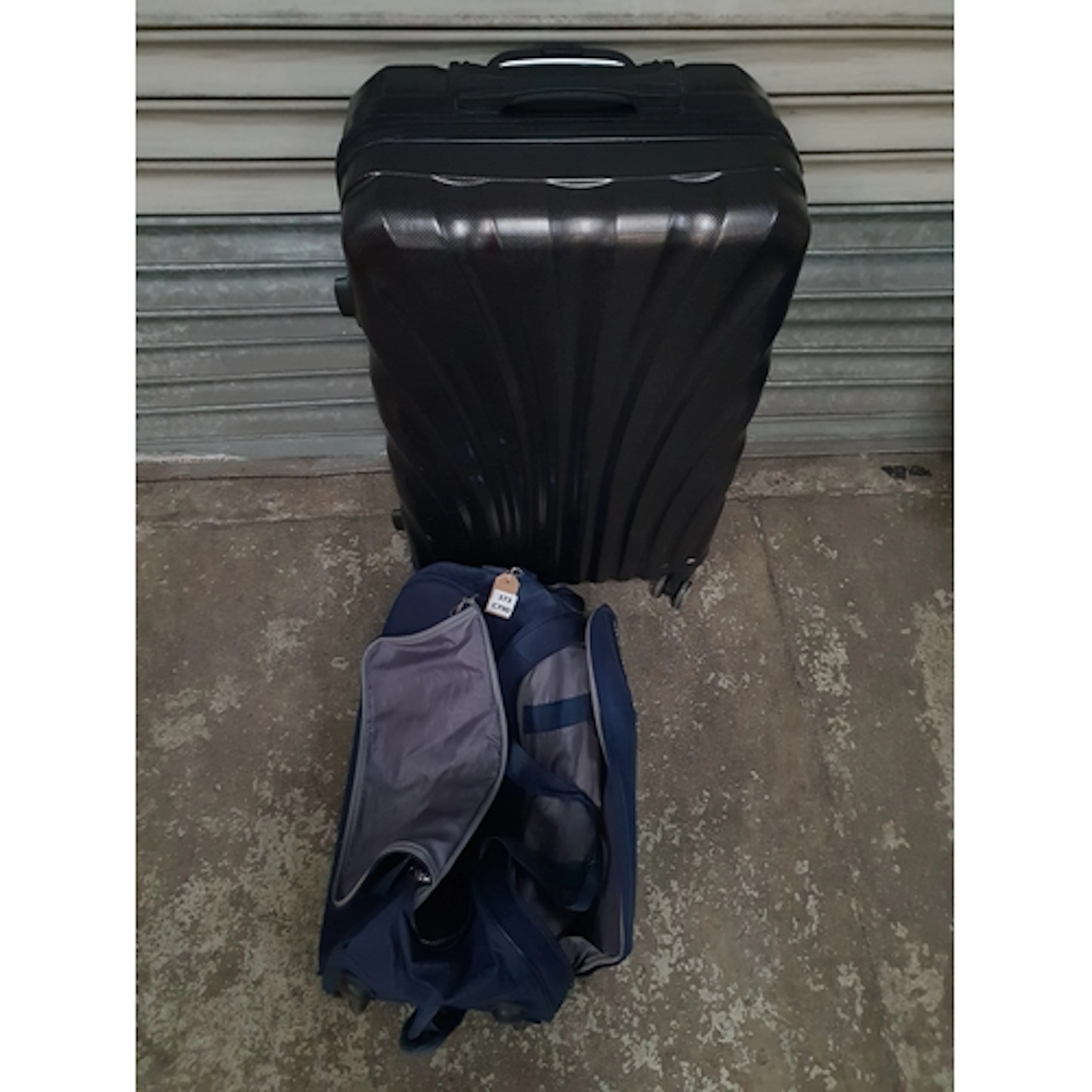 ONE SUITCASE AND HOLDAL including American Tourister (2) Not...
