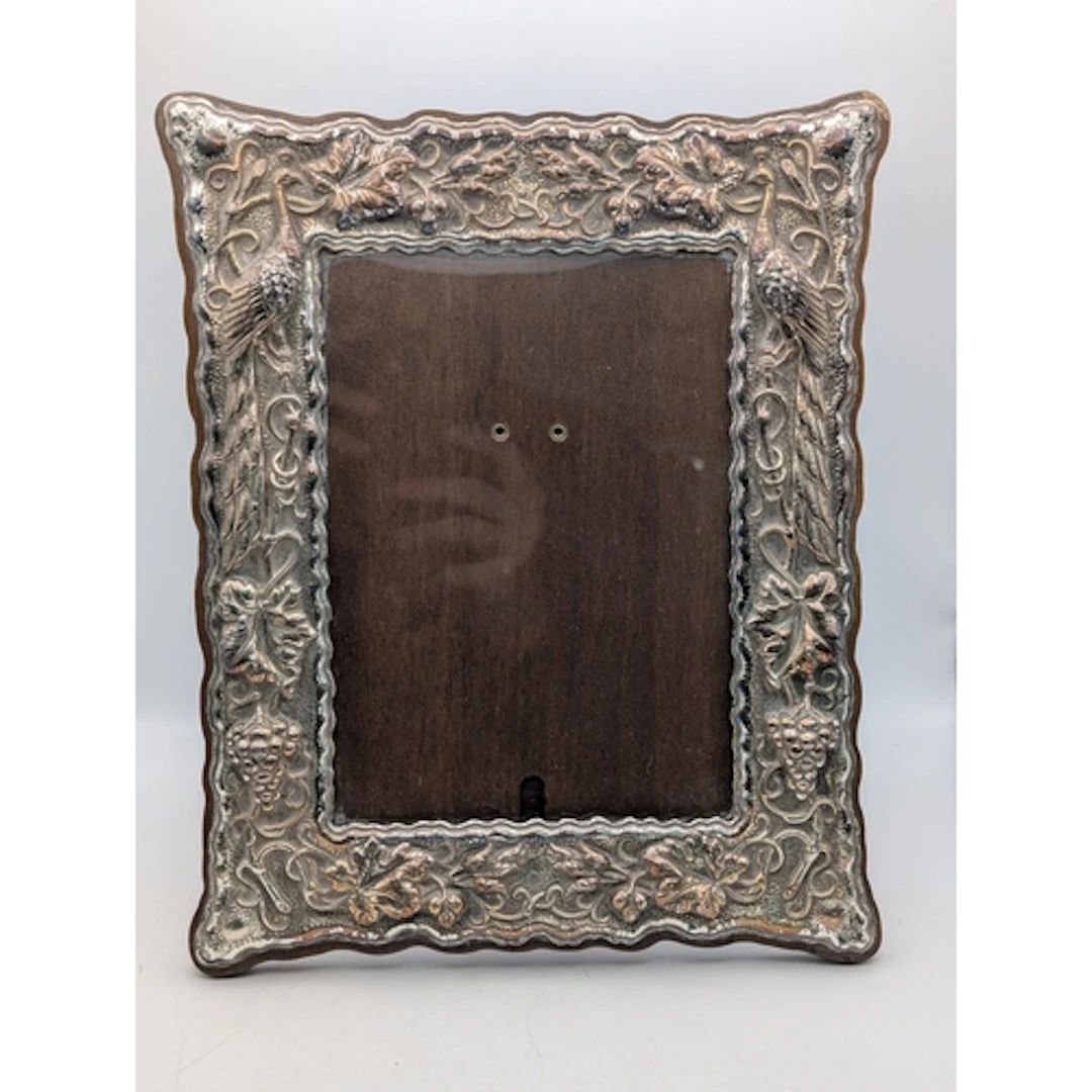 A 950 grade silver fronted easel back photograph frame, havi...
