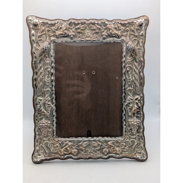 A 950 grade silver fronted easel back photograph frame, havi...