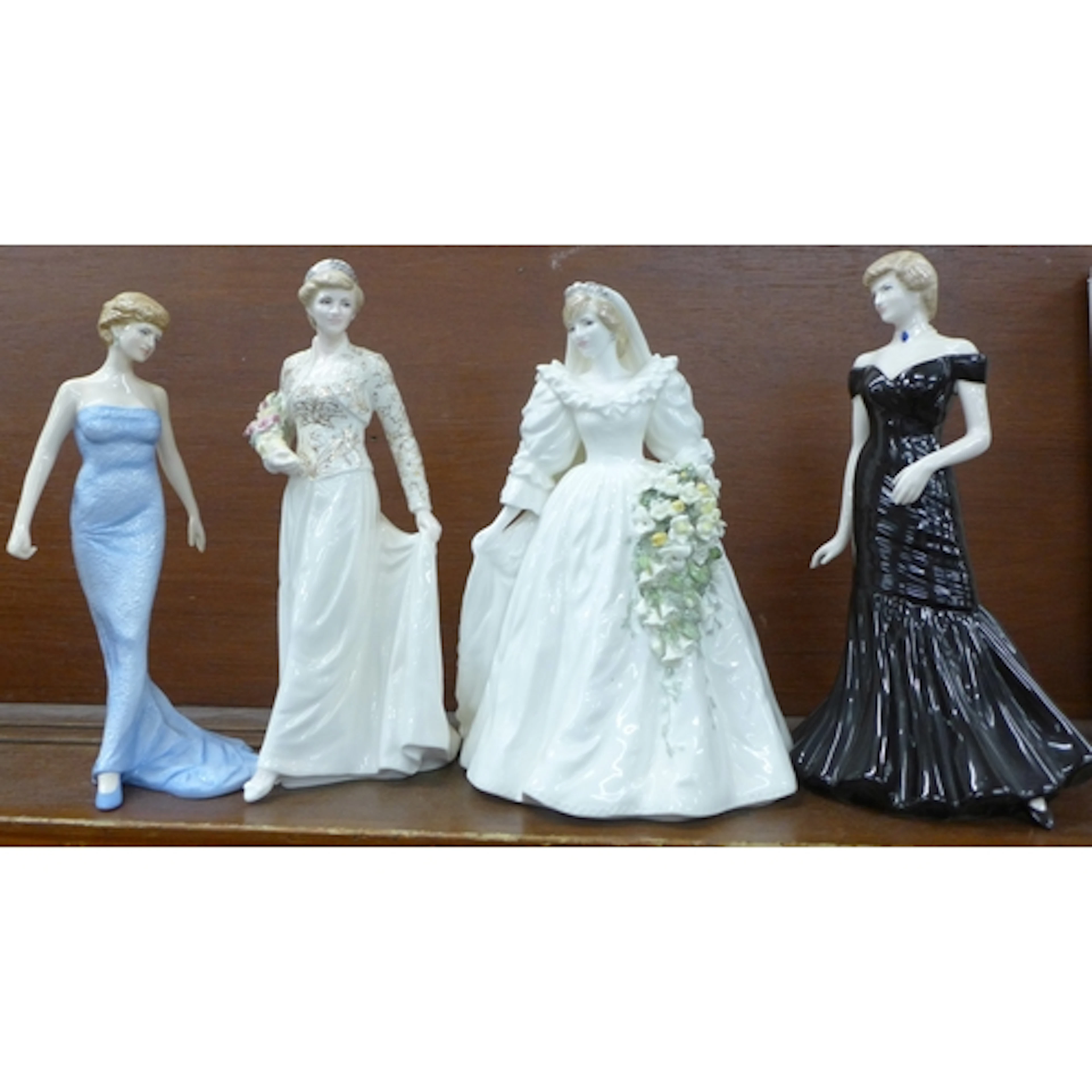 Four Diana figures inlcuding Royal Doulton, coalport limited...