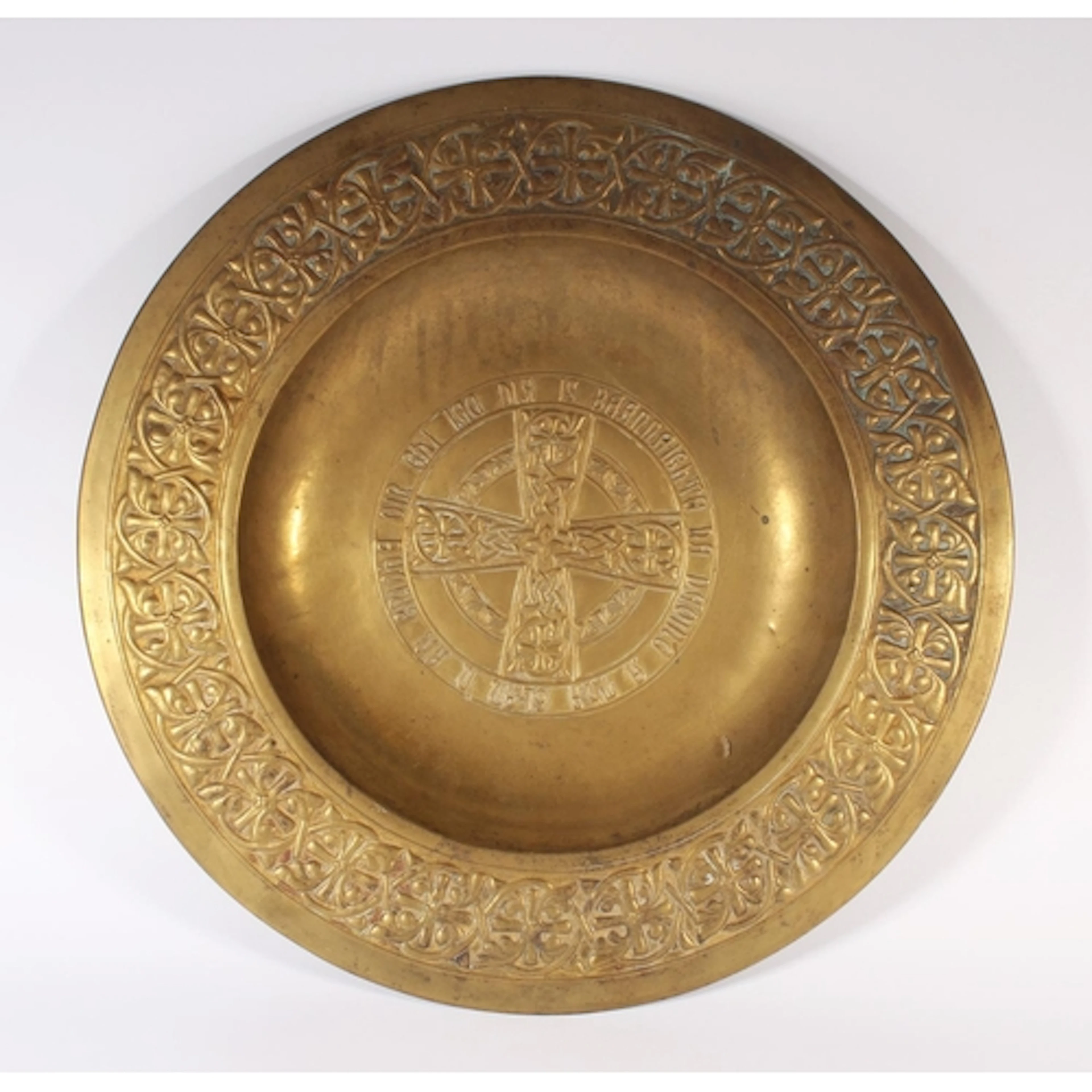 Antique brass offertory plate or charger, with geometric pat...