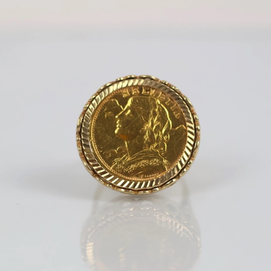 An early 20th century Swiss 20 Franc coin, dated 1933, mount...