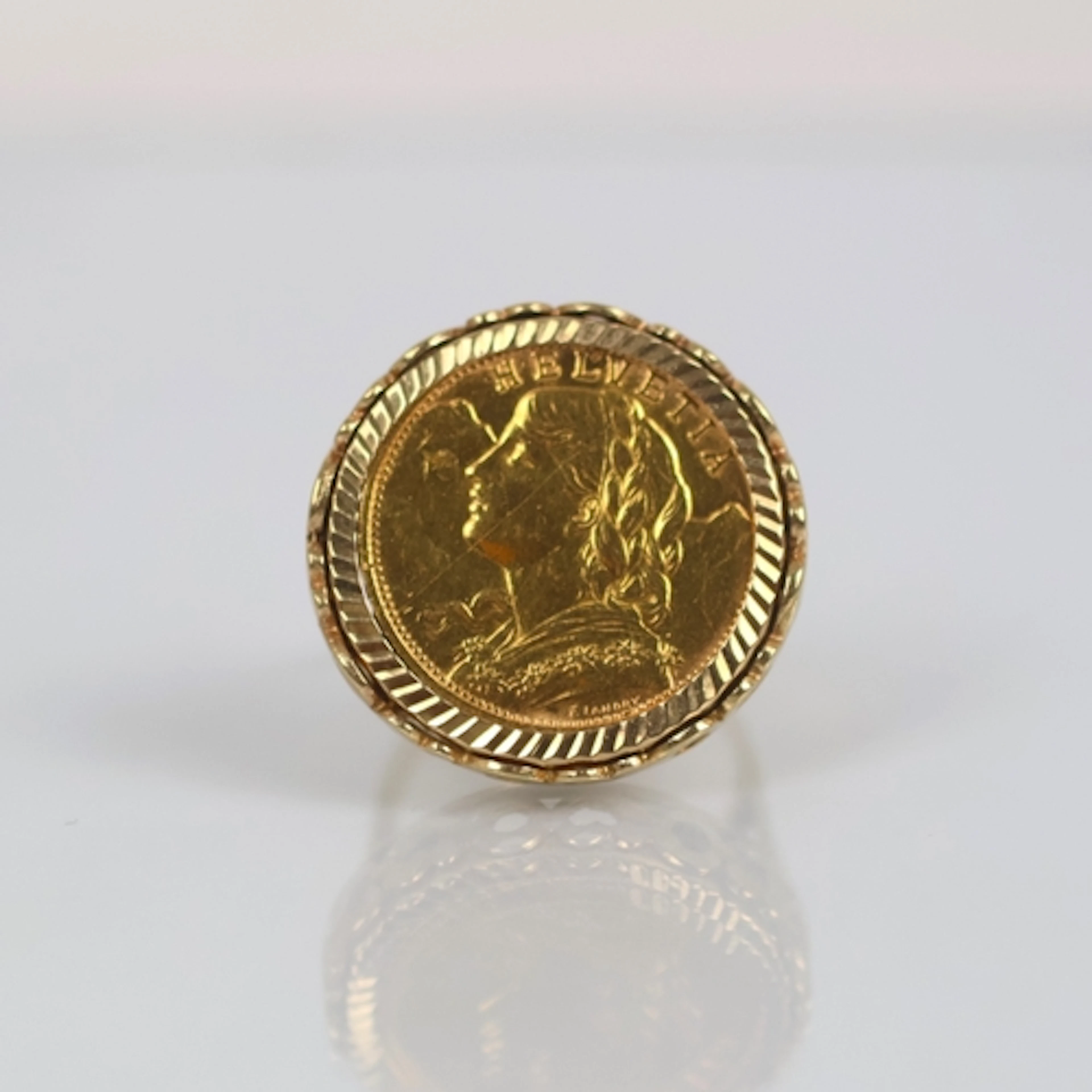 An early 20th century Swiss 20 Franc coin, dated 1933, mount...