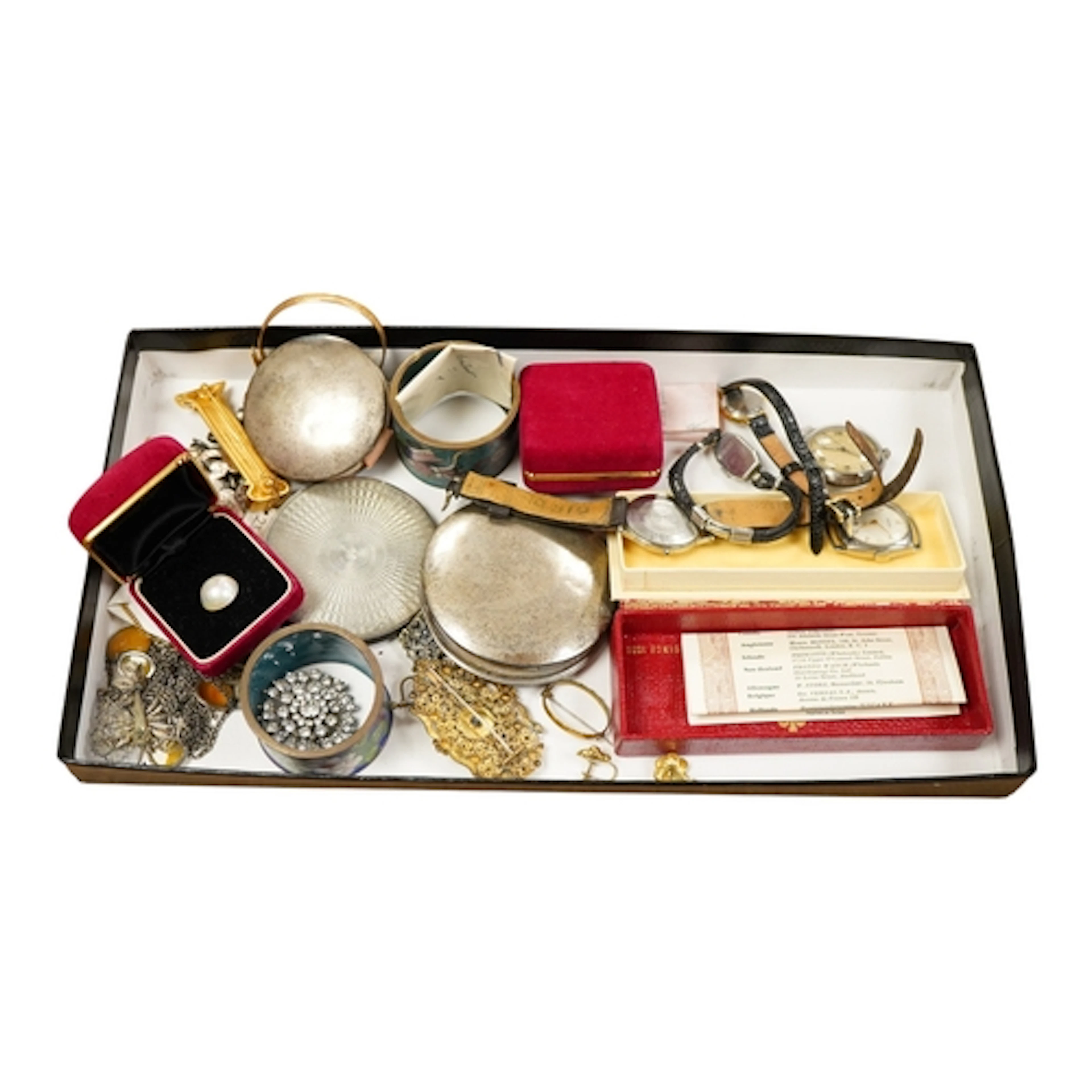A George V silver compact, Birmingham, 1921, two white metal...