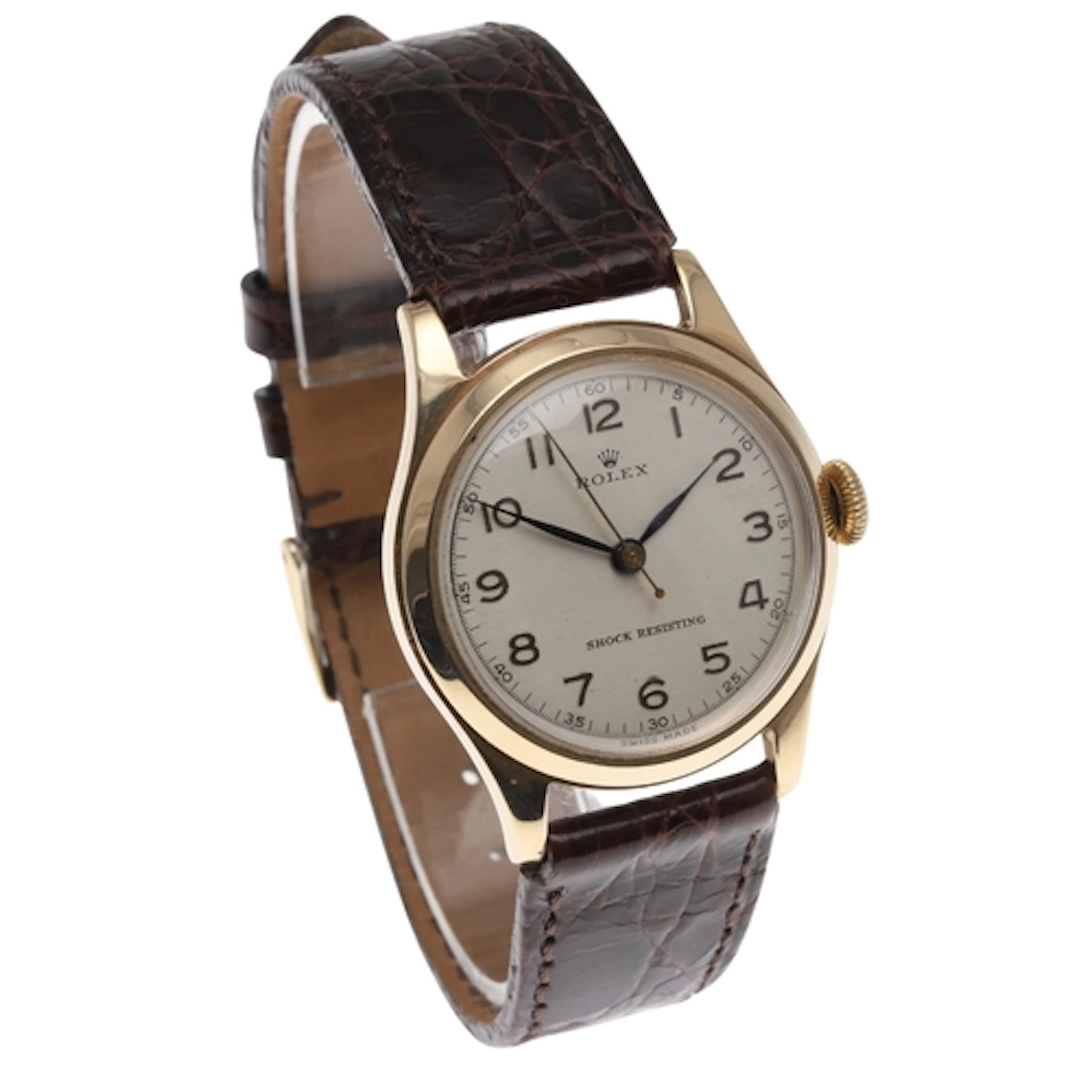 A GENTLEMAN'S 9CT GOLD WRISTWATCH BY ROLEX. the signed circu...